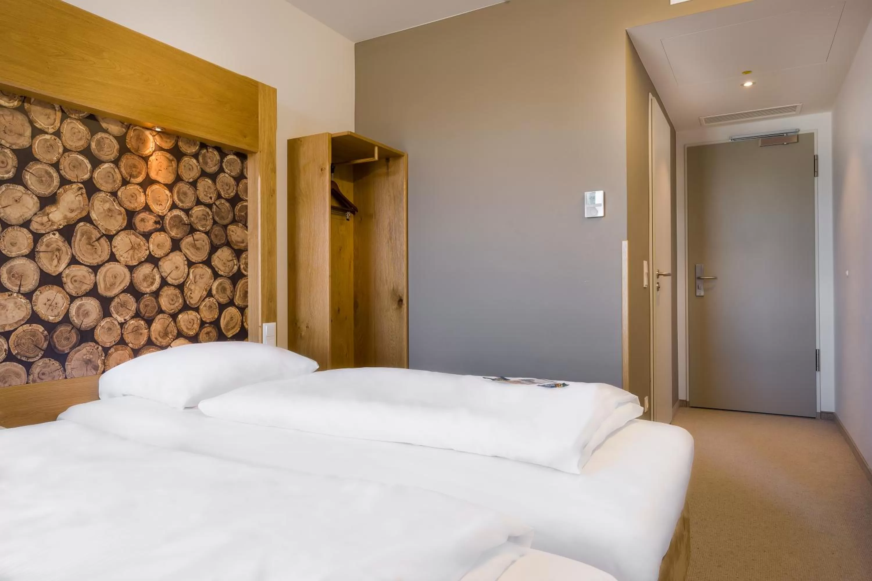 Bed in Atomis Hotel Dachau Munich