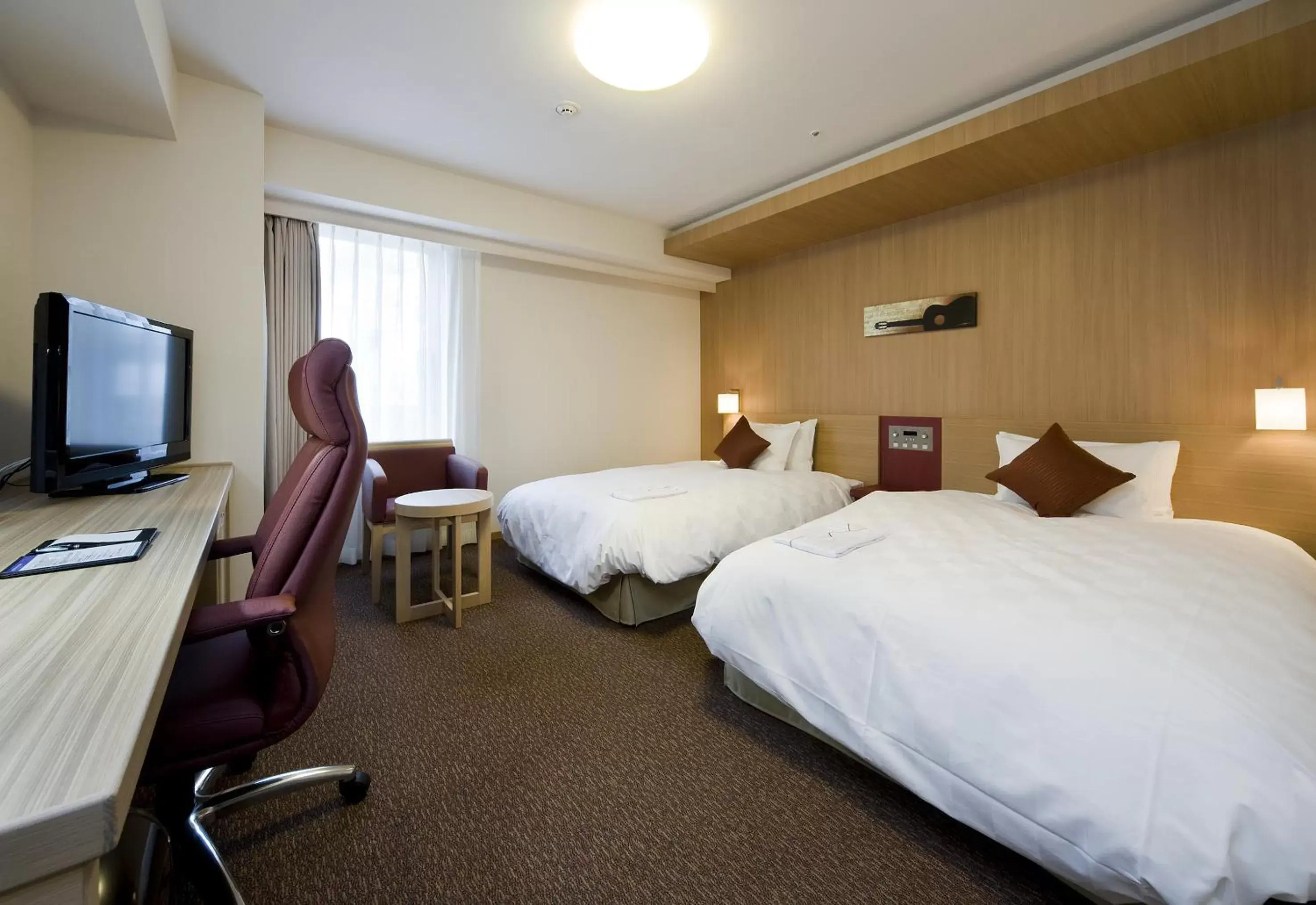 Photo of the whole room, Bed in Daiwa Roynet Hotel Hamamatsu