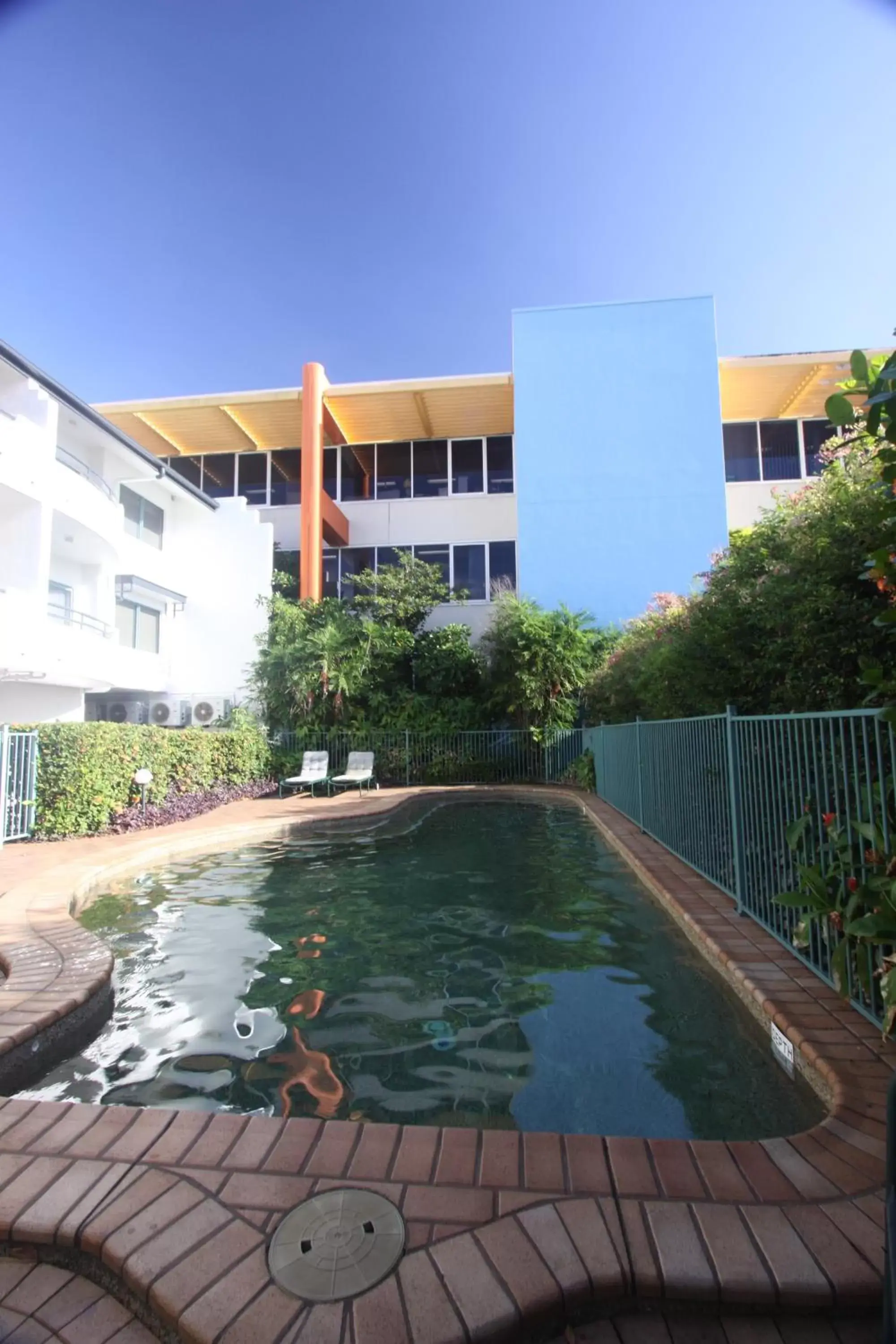 Pool view, Property Building in Mid City Luxury Suites