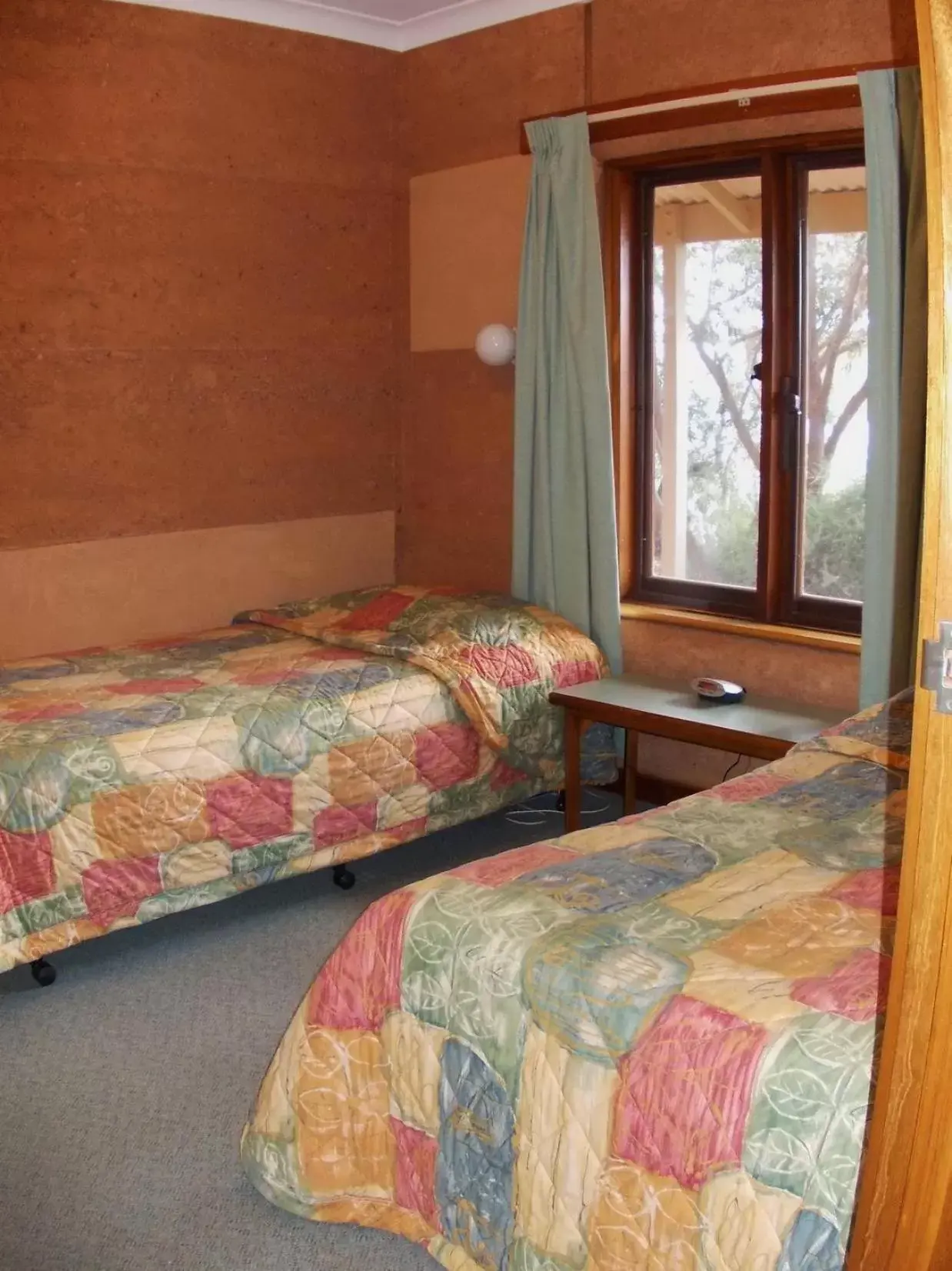 Bed in Mud Hut Motel