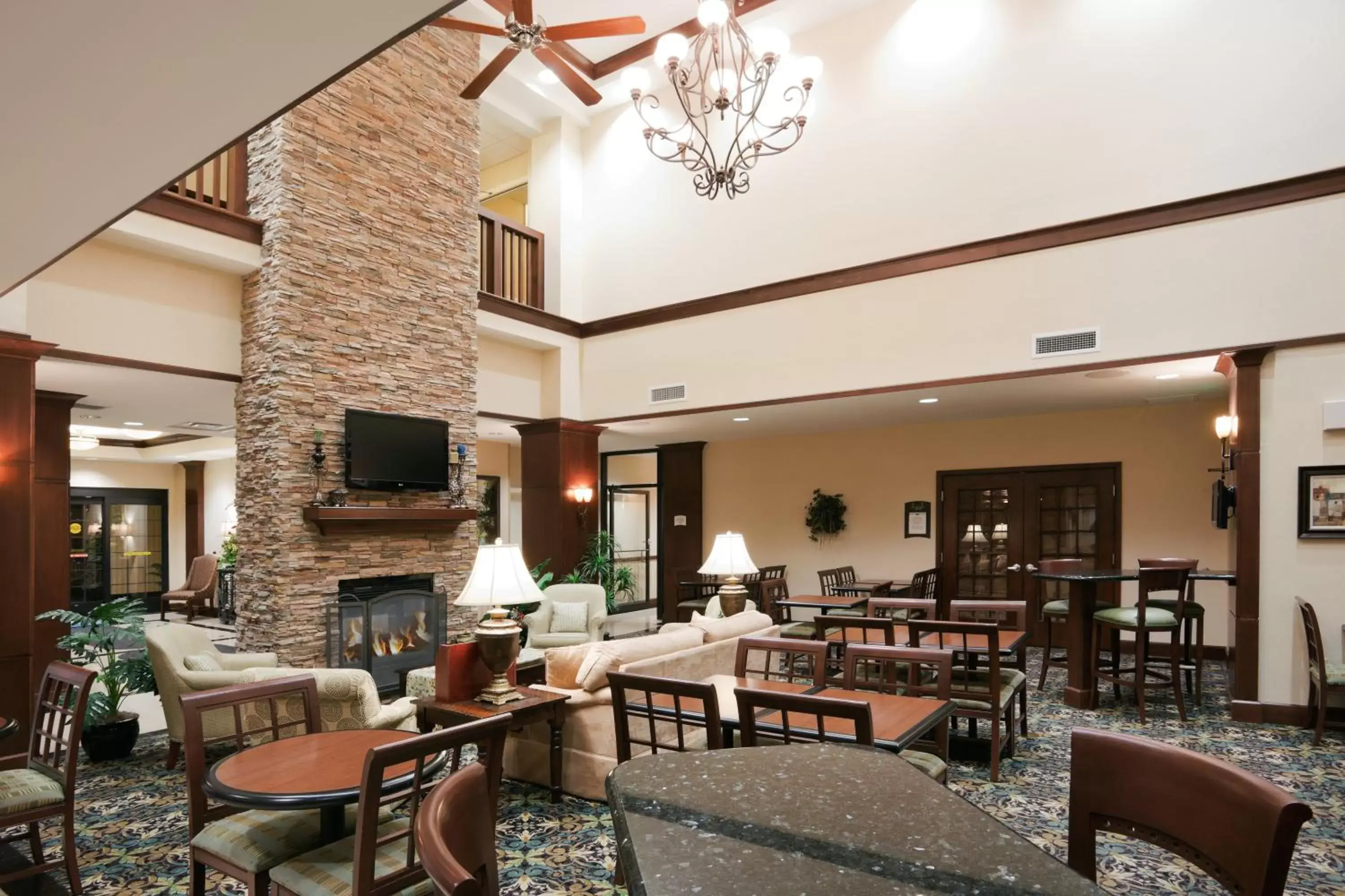 Lobby or reception, Restaurant/Places to Eat in Staybridge Suites Lafayette-Airport, an IHG Hotel