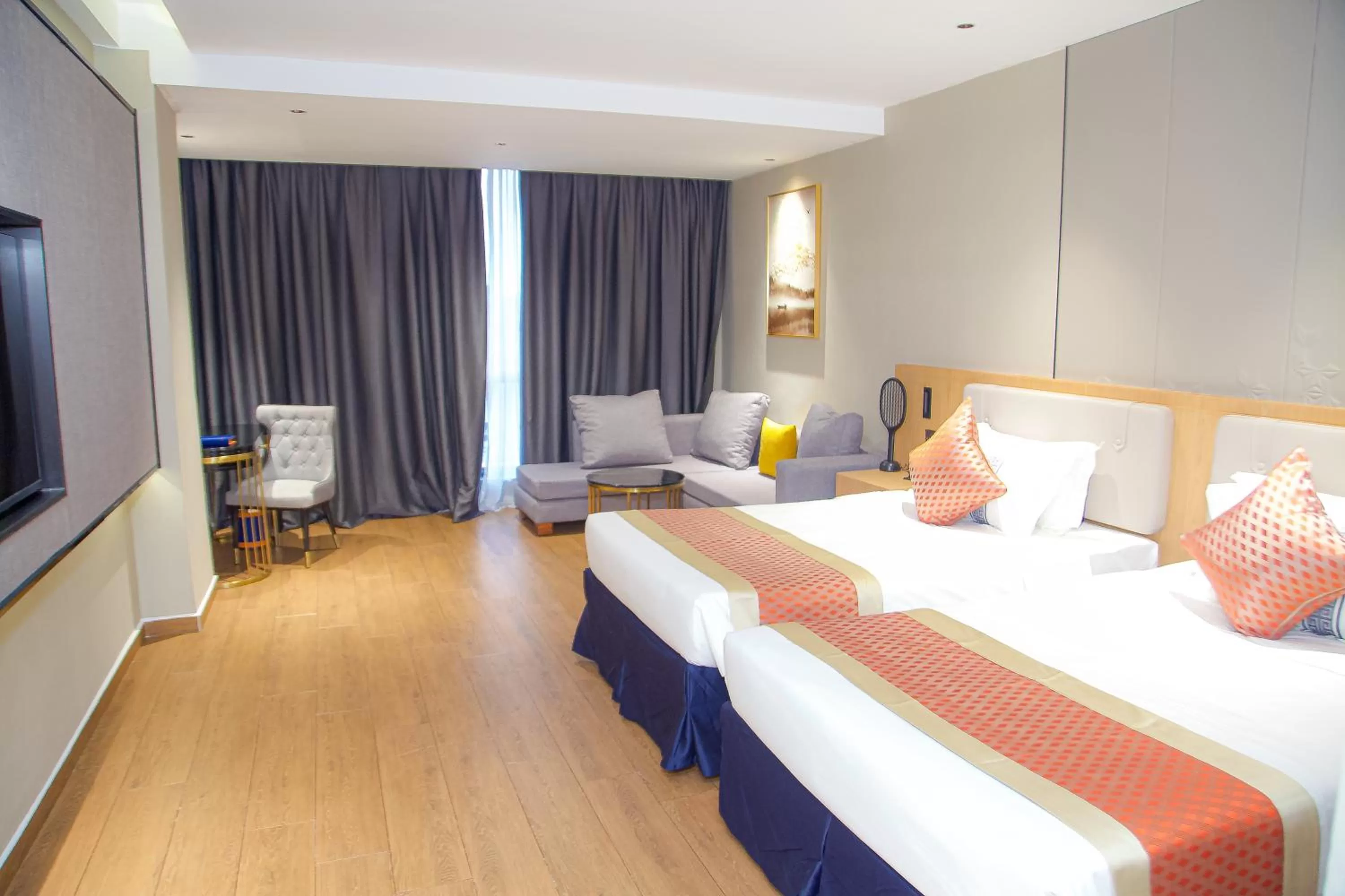 Photo of the whole room in Hôtel FAMILLE MONDIALE