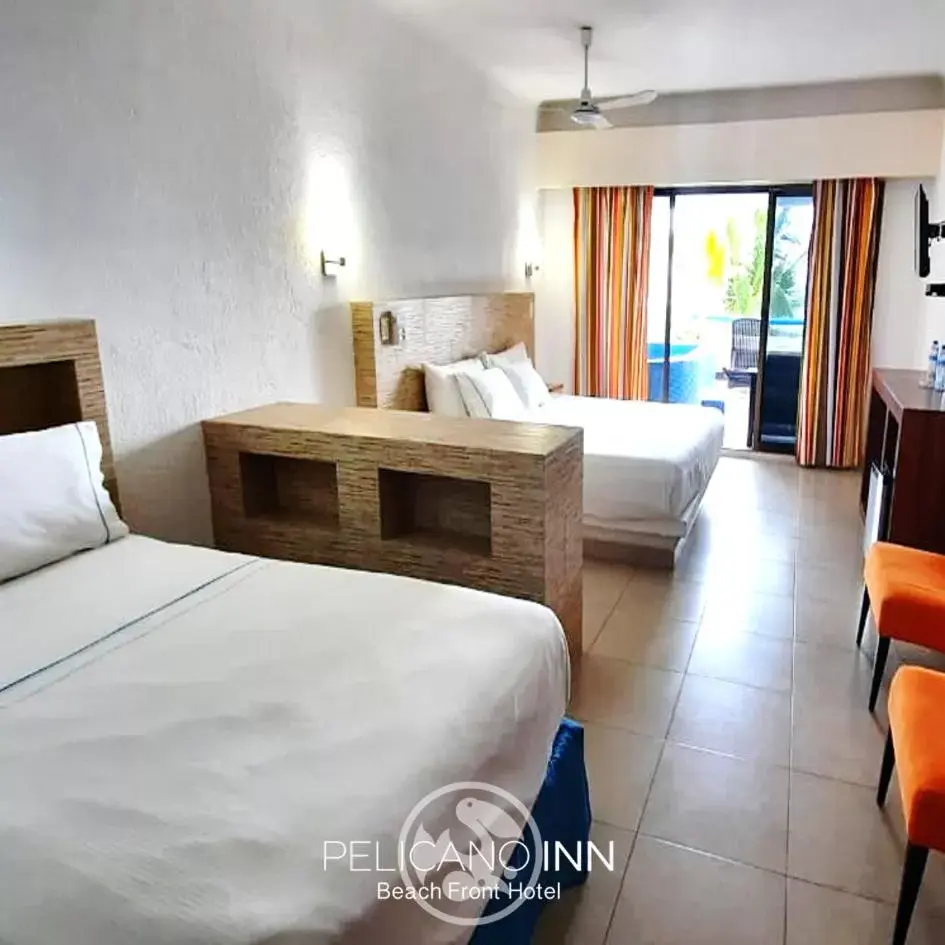 Photo of the whole room in Pelicano Inn Playa del Carmen - Beachfront Hotel