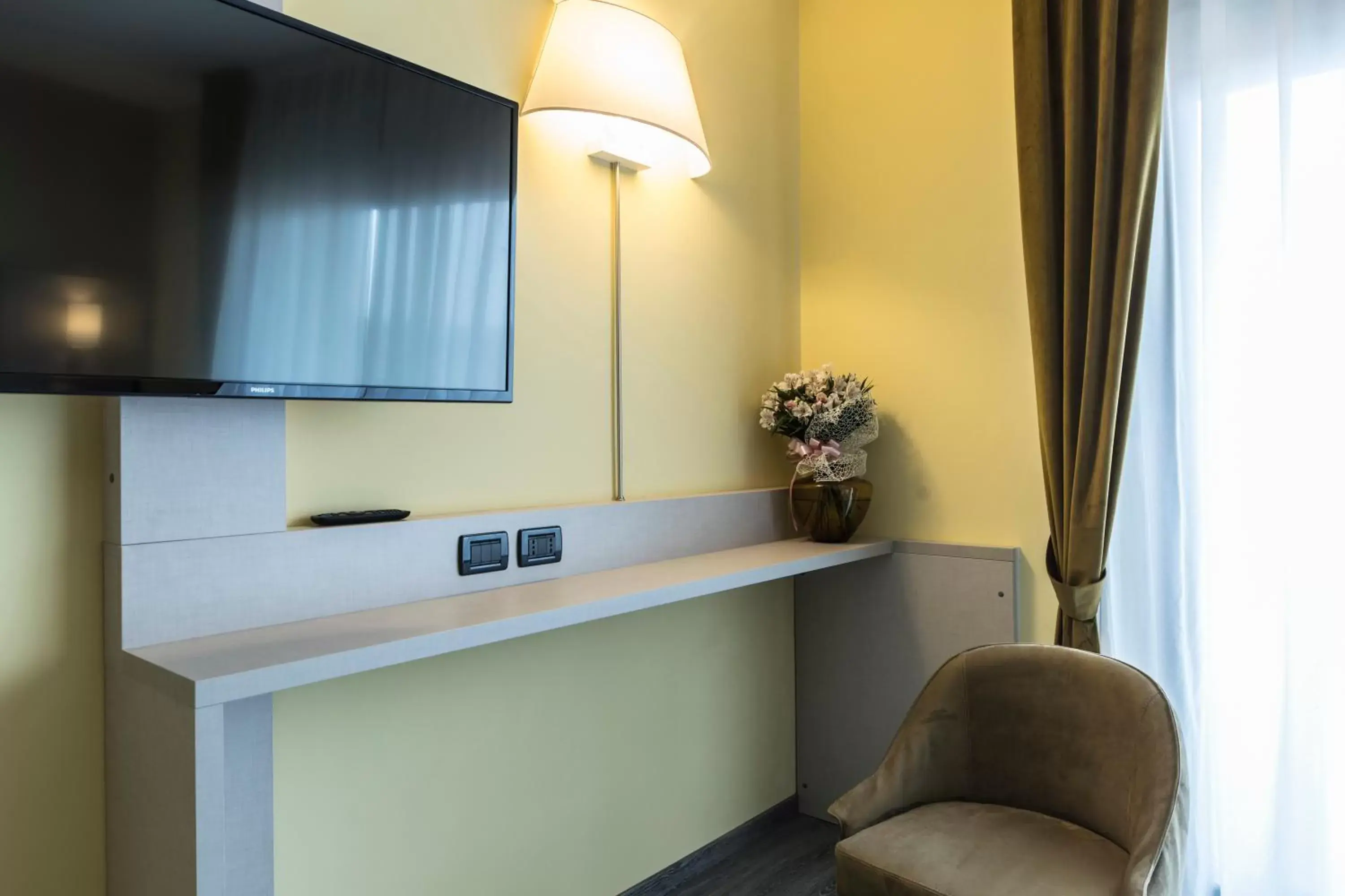 TV and multimedia, TV/Entertainment Center in Hotel Donatello Imola