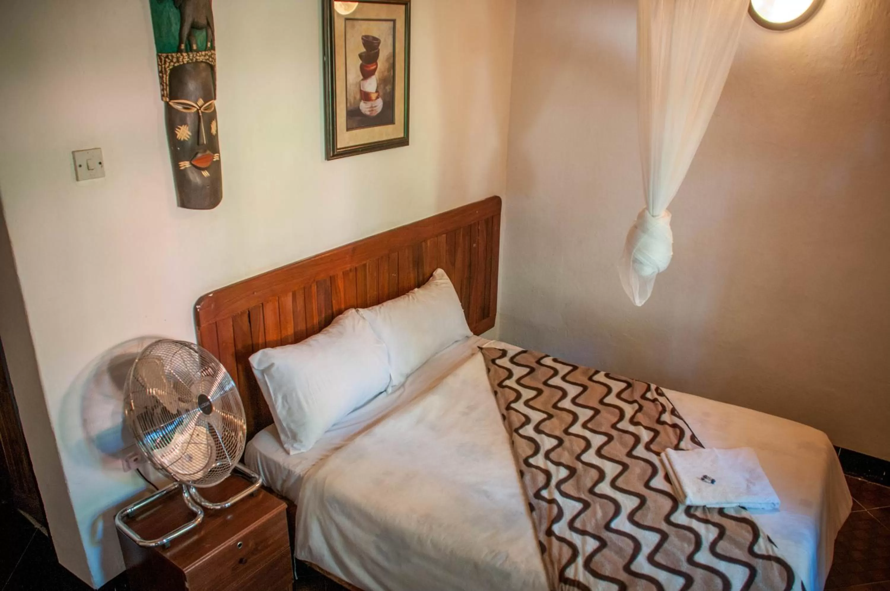 Bed in Okavango Lodge