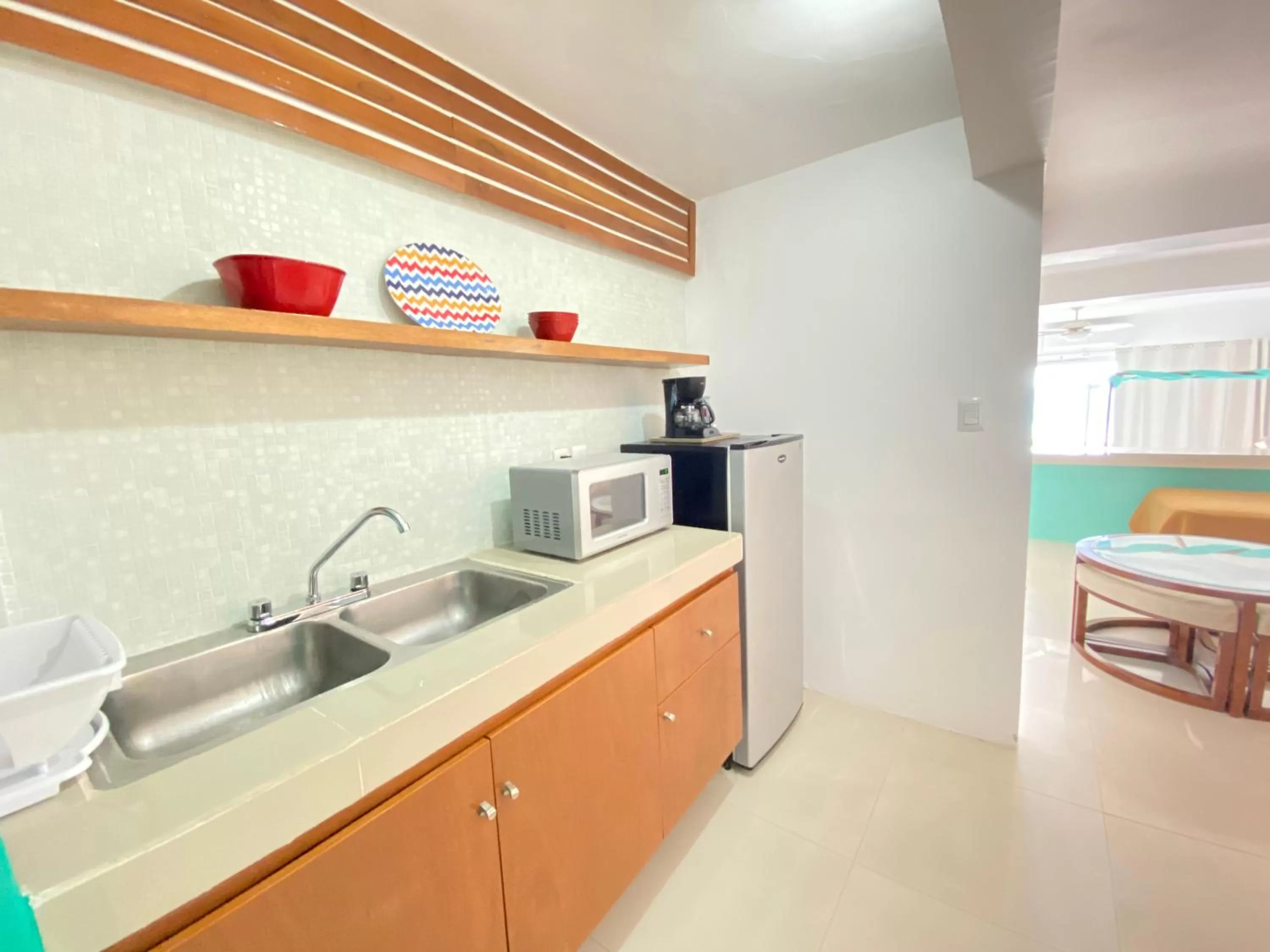 Kitchen or kitchenette in Rocamar Hotel Isla Mujeres