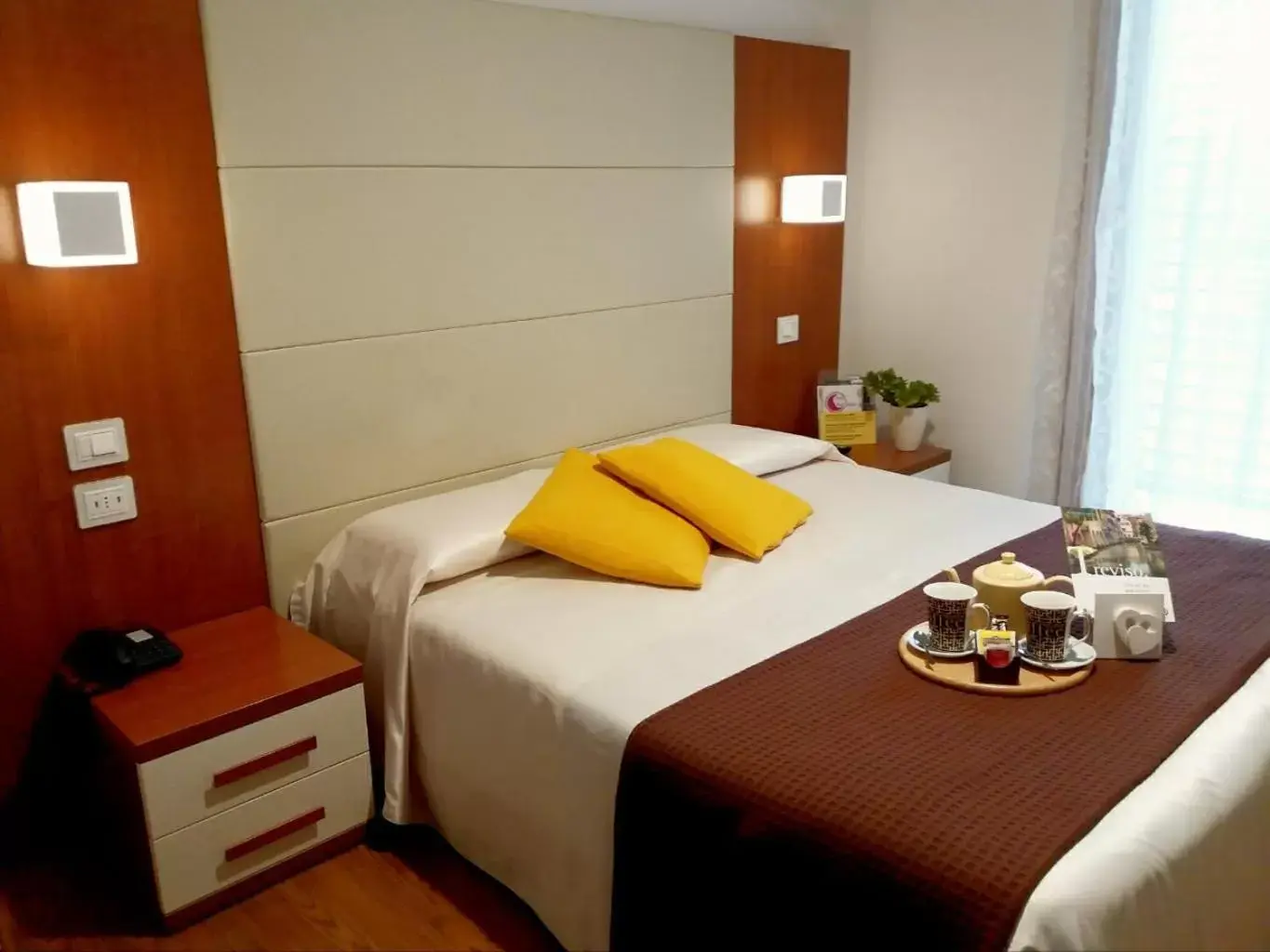 Bed in Hotel Mezzaluna