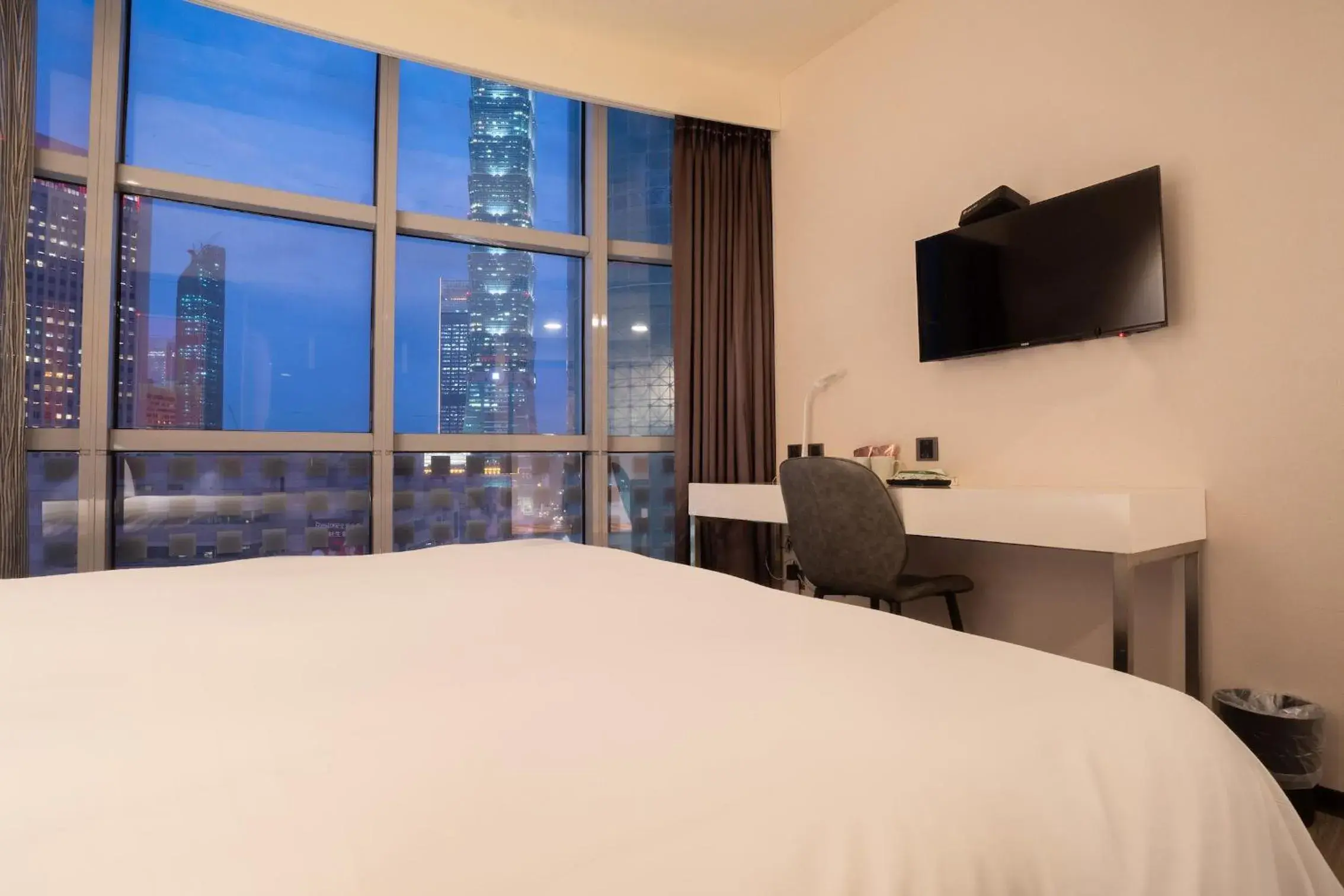 Bed in CHECK inn Taipei Xinyi (Quarantine Hotel)