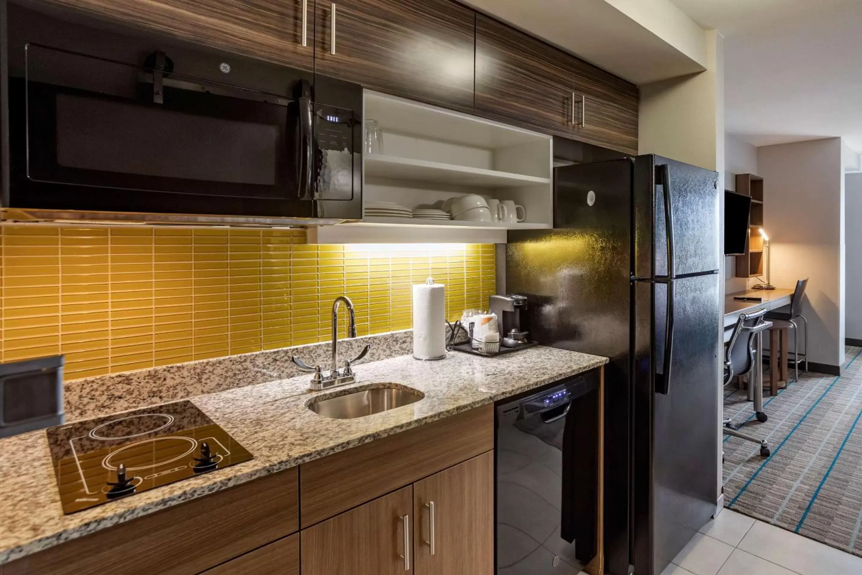 Bedroom, Kitchen/Kitchenette in MainStay Suites