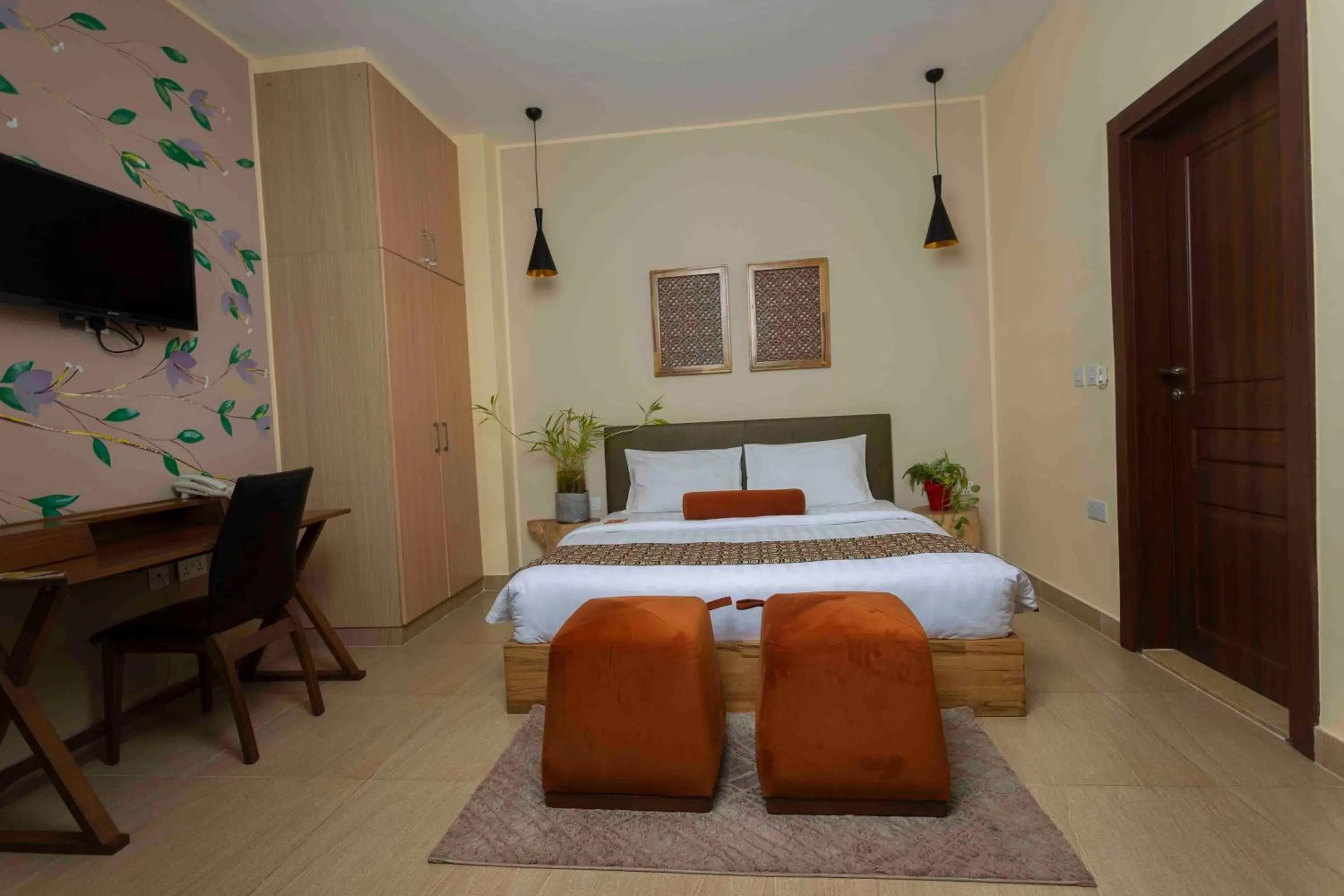 Bed in Roots Hotel Apartment