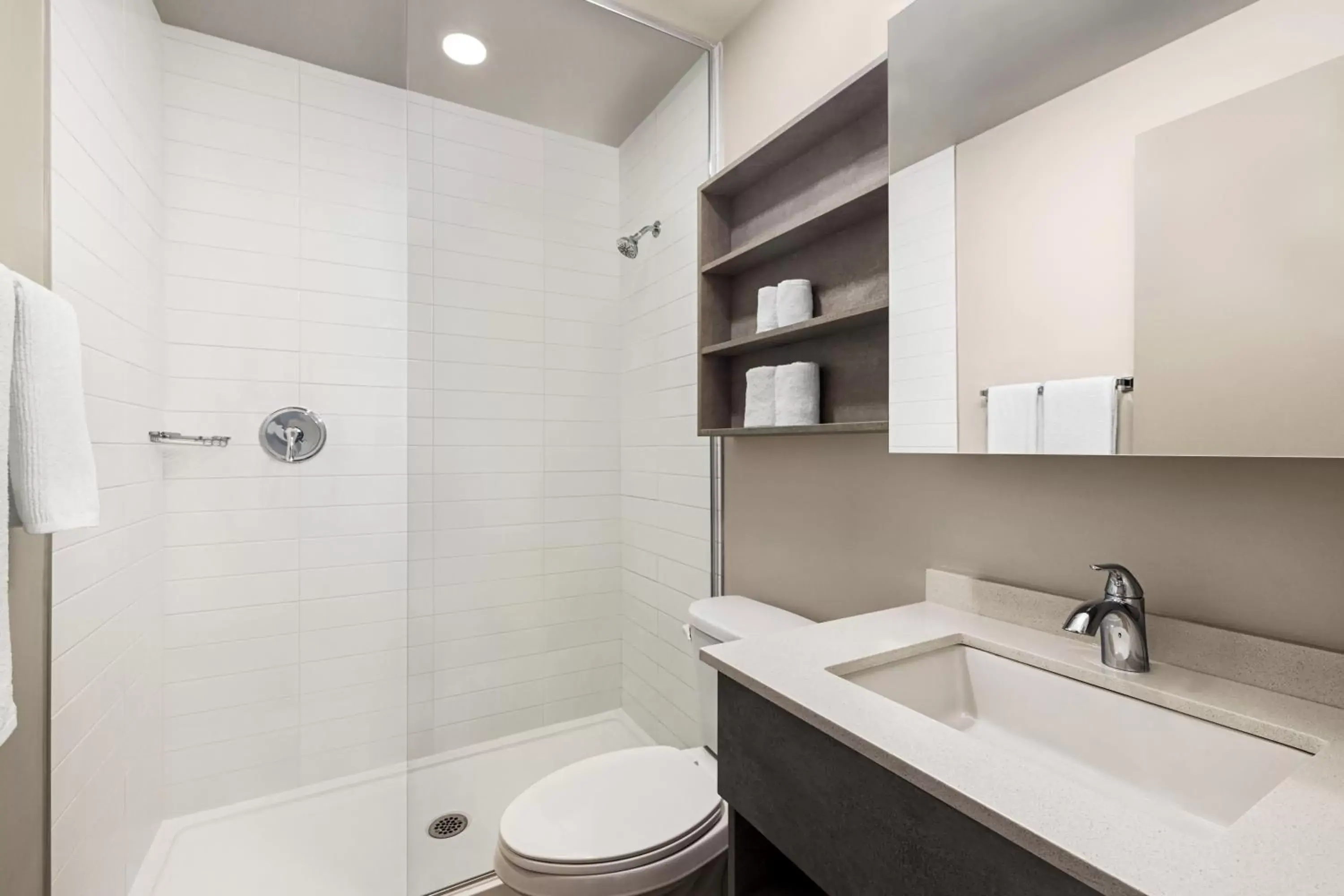 Shower, Bathroom in Microtel Inn & Suites Montreal Airport-Dorval QC