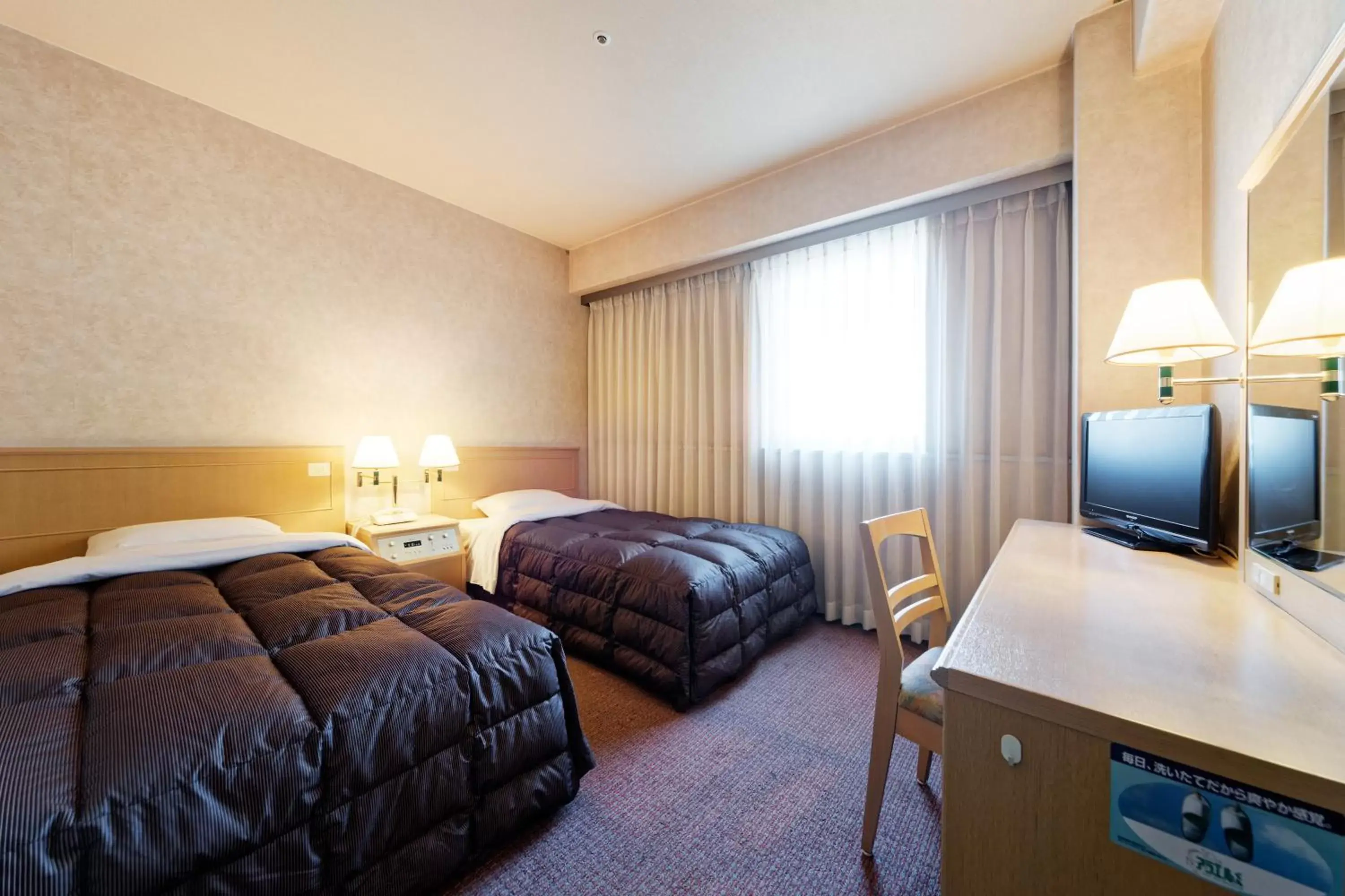 Bed in Kurume Washington Hotel Plaza