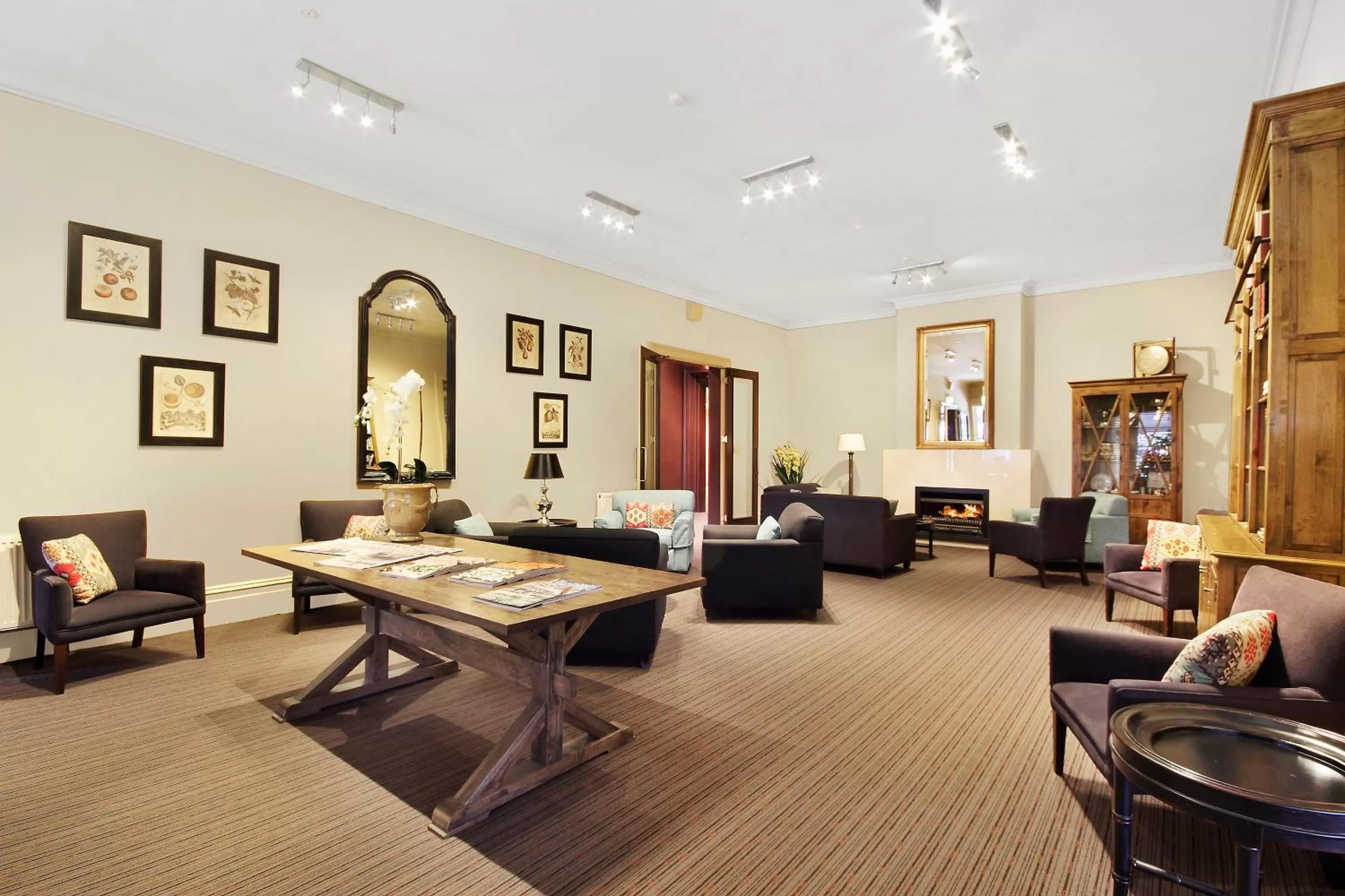 Communal lounge/ TV room in Peppers Craigieburn Resort