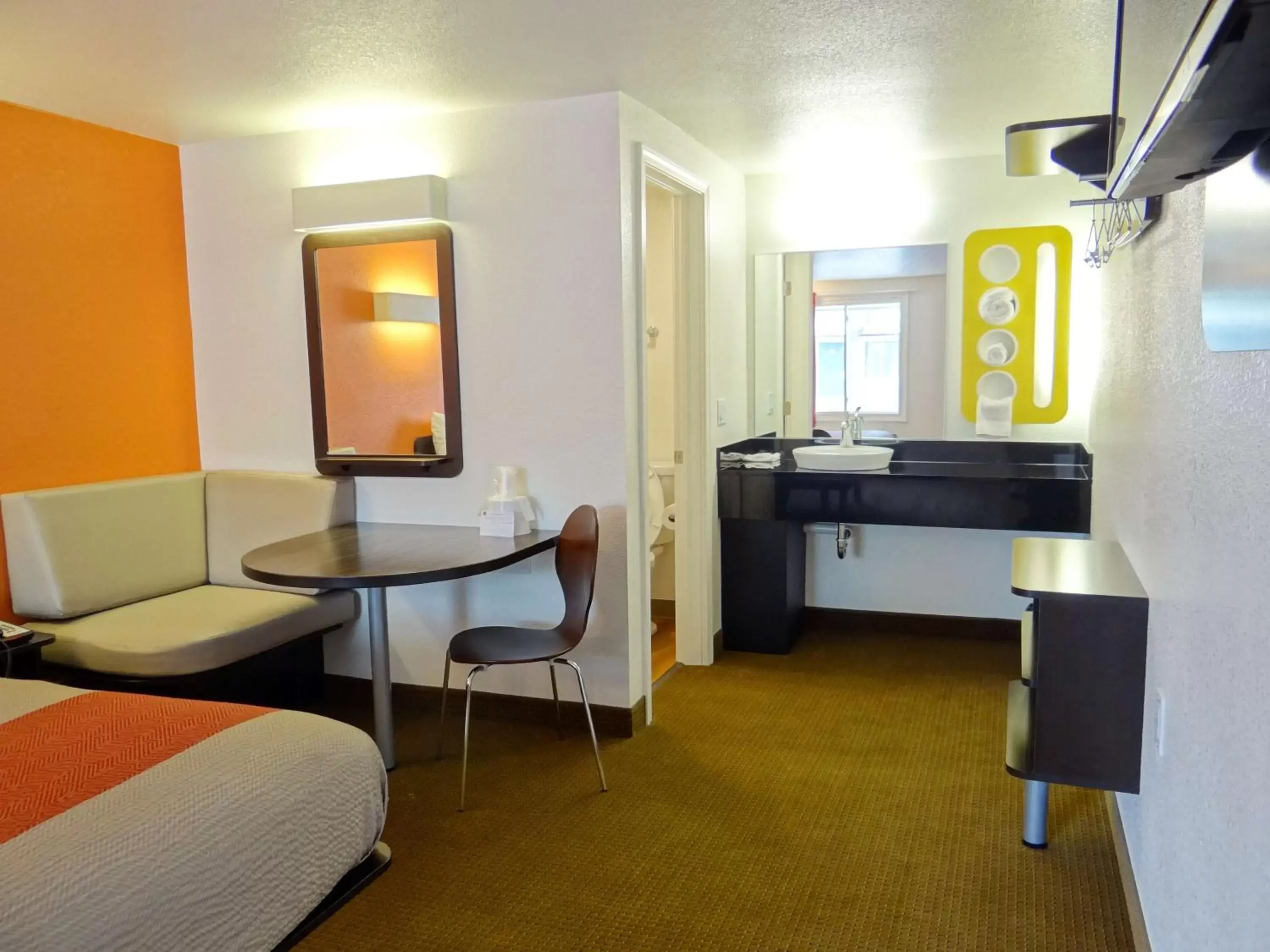 Bathroom, TV/Entertainment Center in Motel 6-Erie, PA