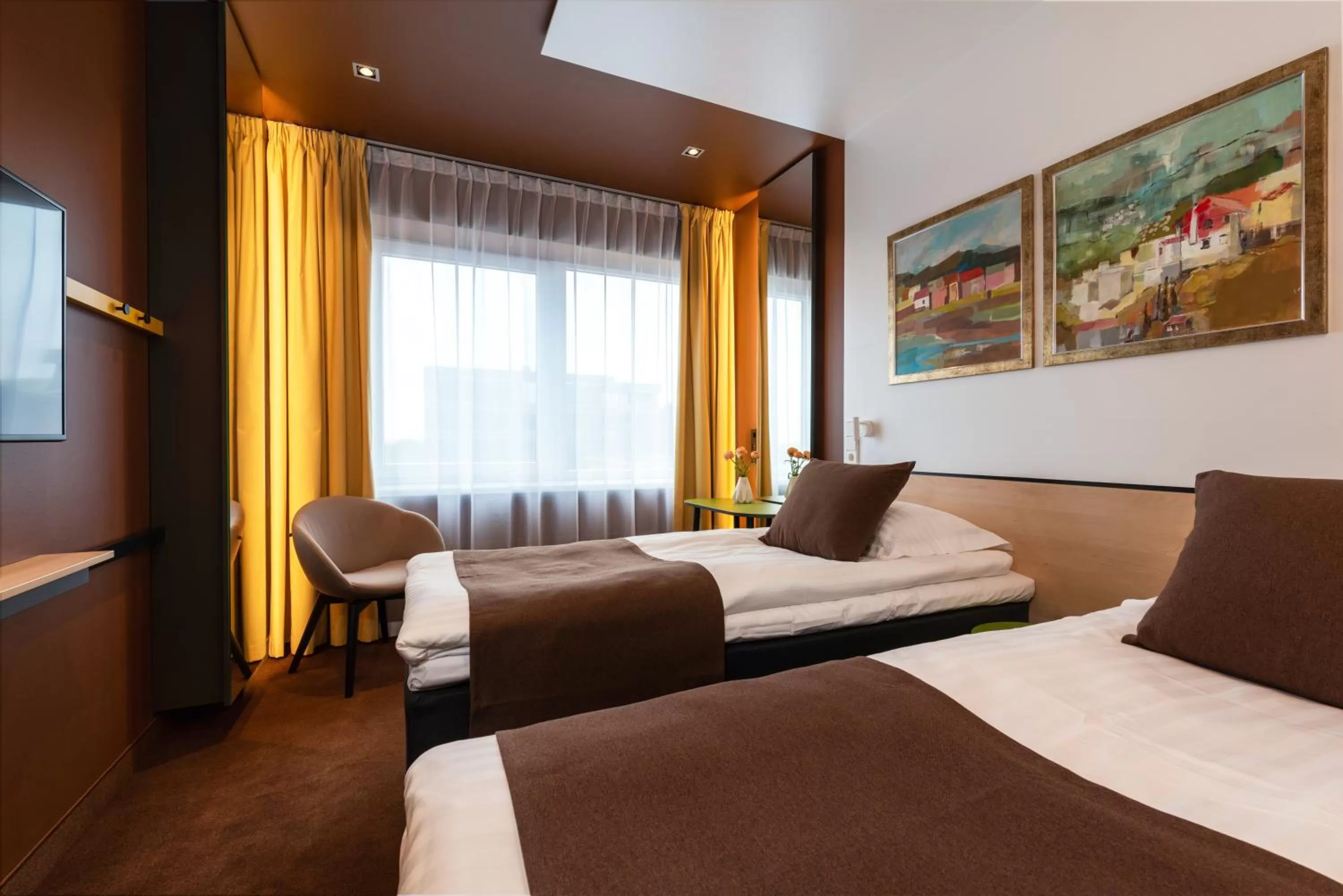 Bed in Art Hotel Pallas by Tartuhotels