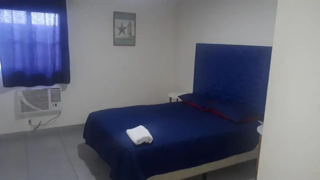 Photo of the whole room, Bed in Express Inn PTY Aeropuerto Internacional Panama