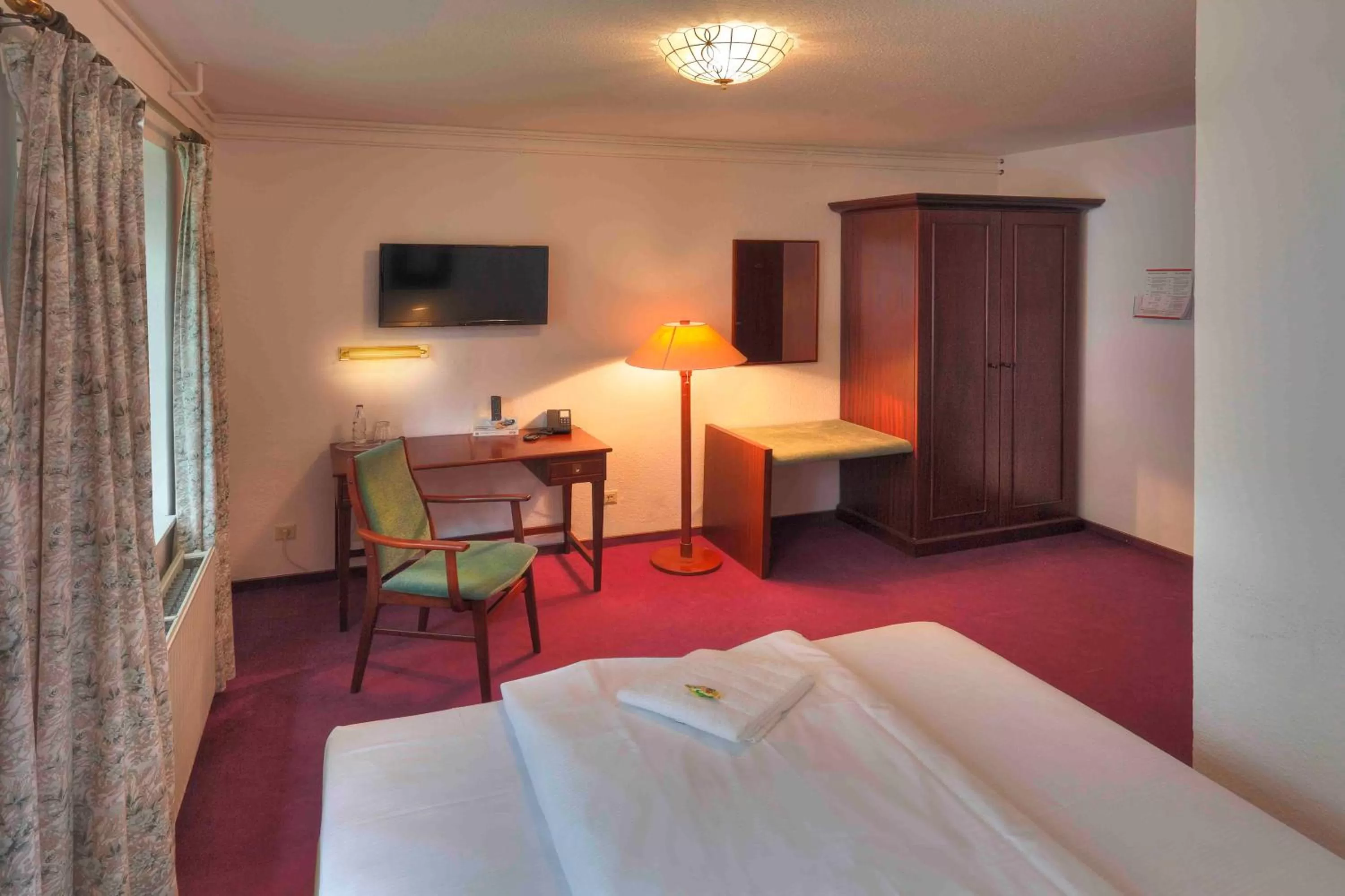 Bed in Hotel Gut Funkenhof