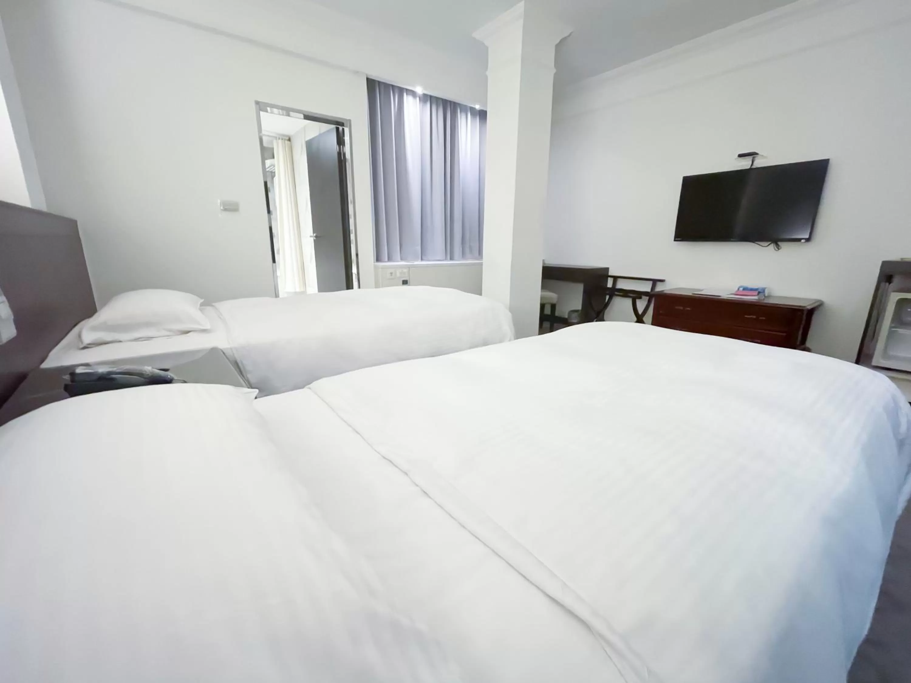 Bed in Guide Hotel Kaohsiung Liuhe