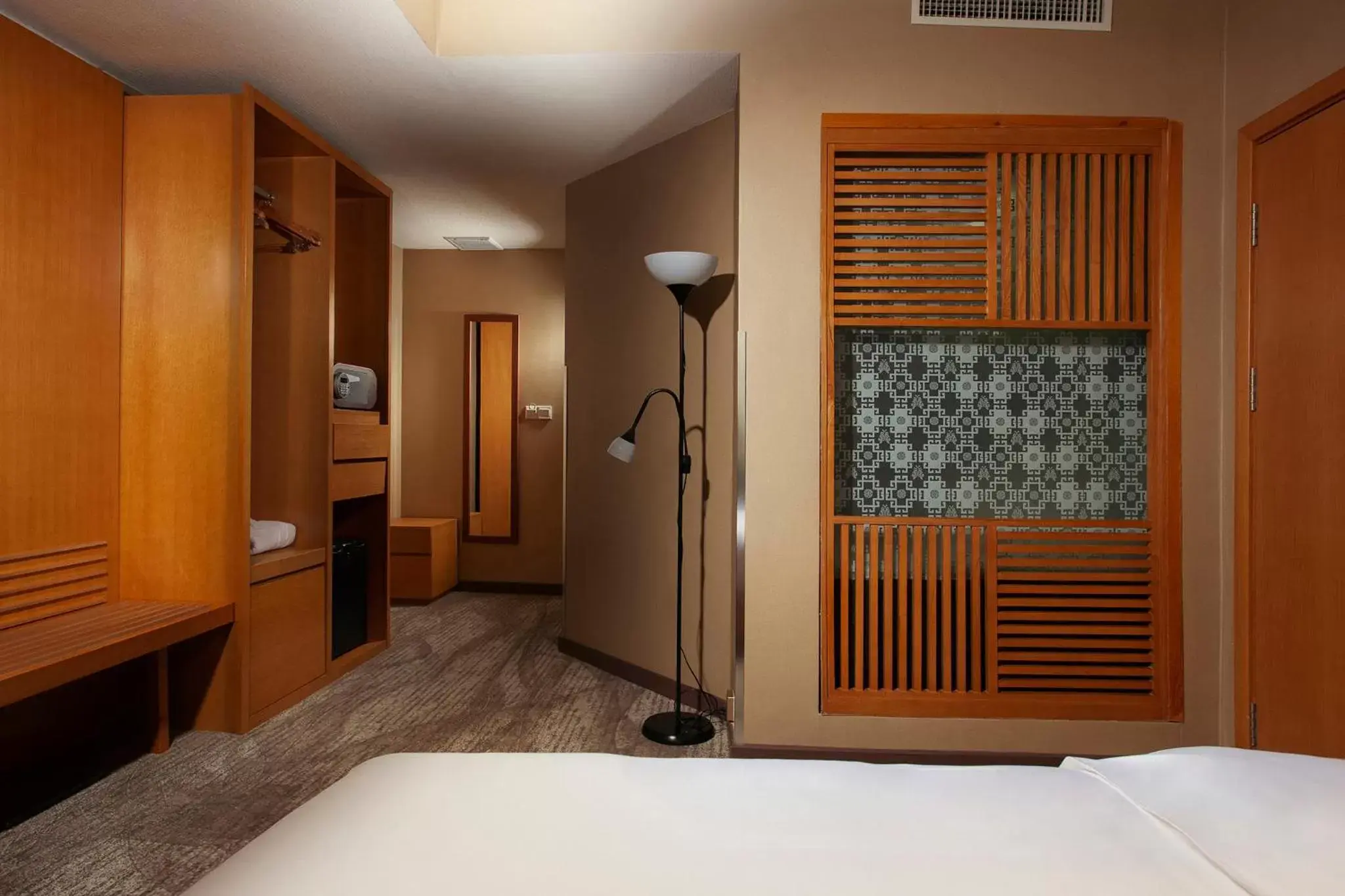 Bed in Ramada Ulaanbaatar City Center Bed in Ramada Ulaanbaatar City Center