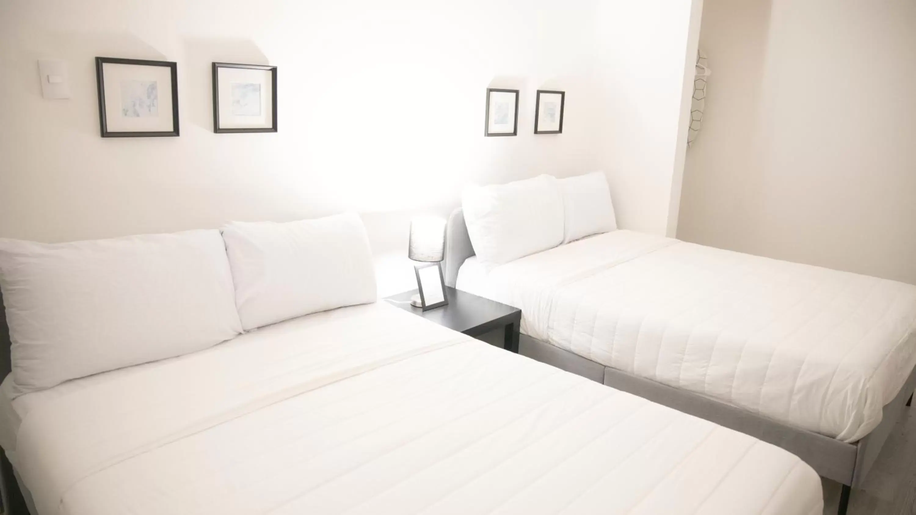 Bed in Hotel Singular Antara