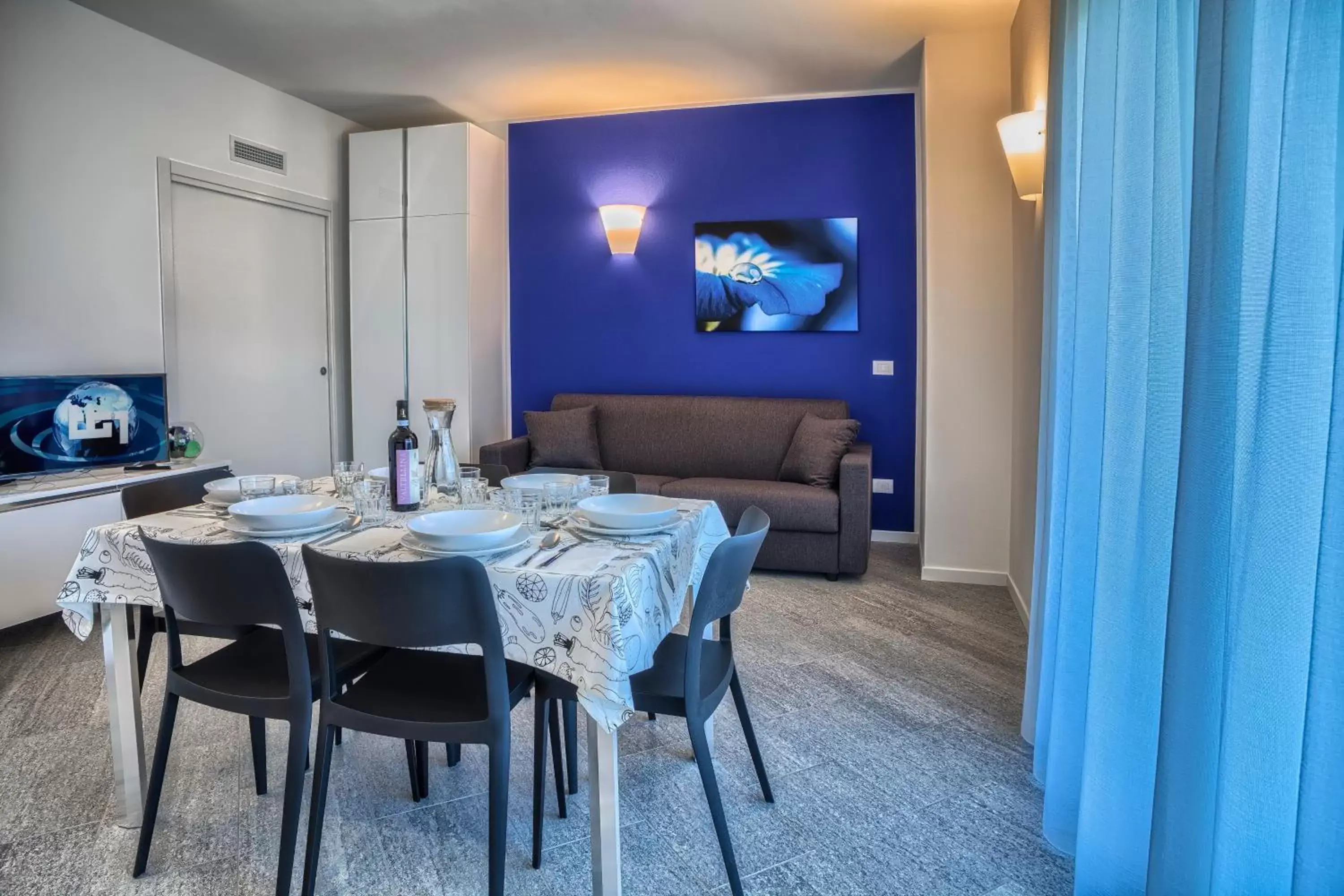 Living room, Dining Area in Rainbow Holiday Apartments Lake Como