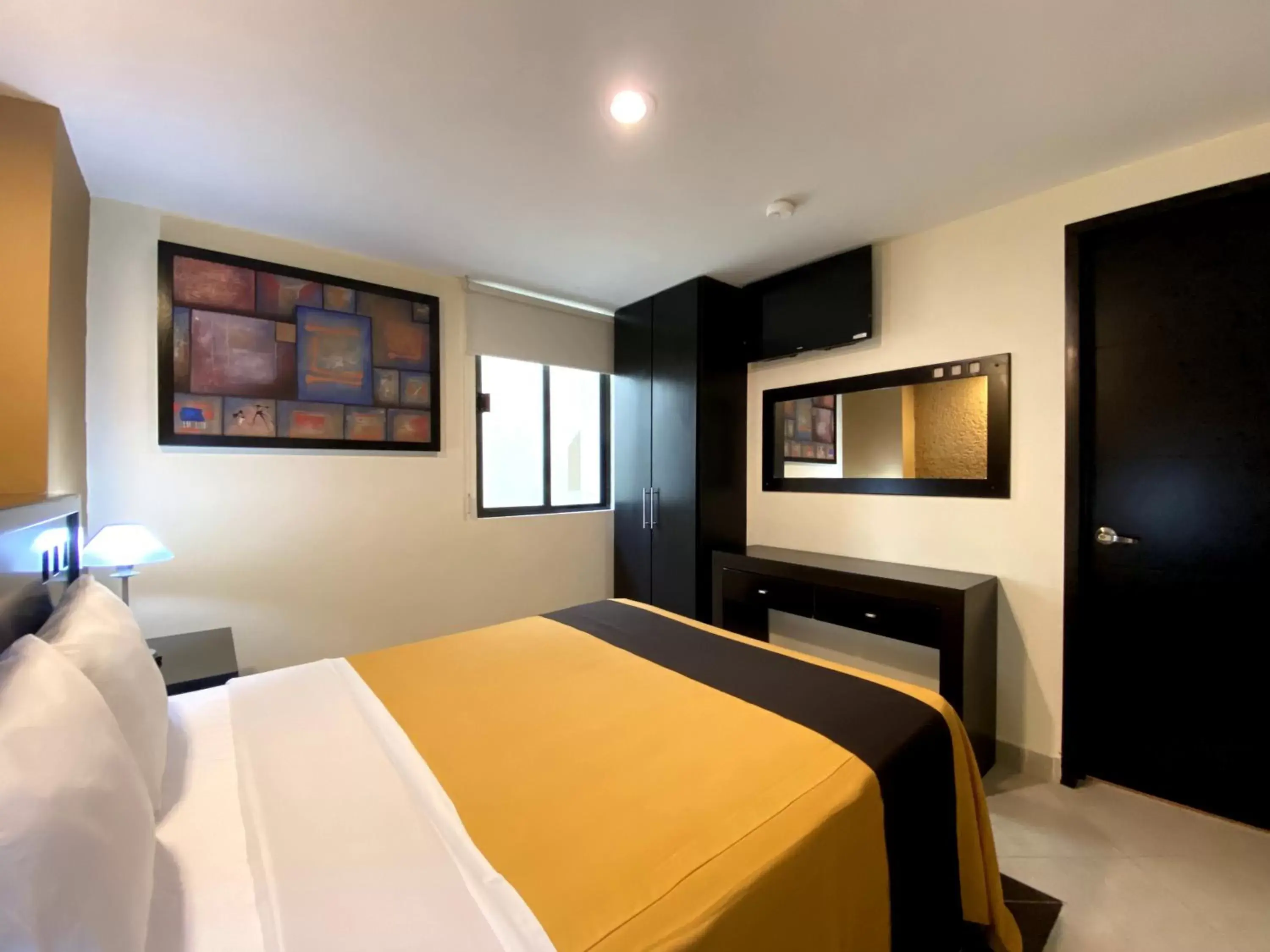 Photo of the whole room, Bed in Hotel Escala Puebla Centro