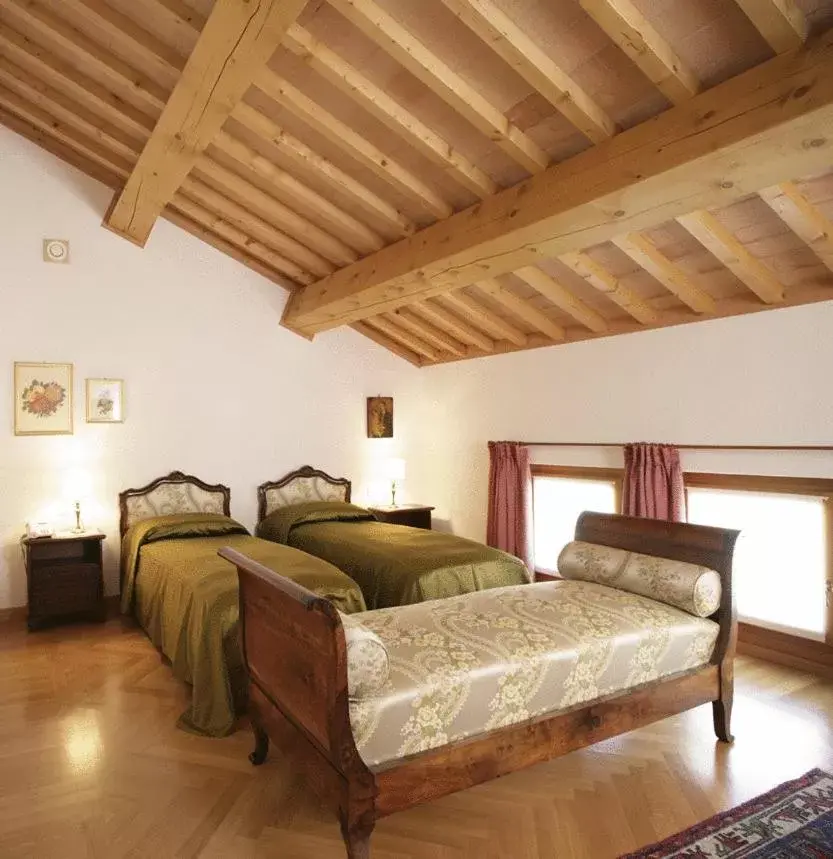 Bed in Villa Busta Hotel