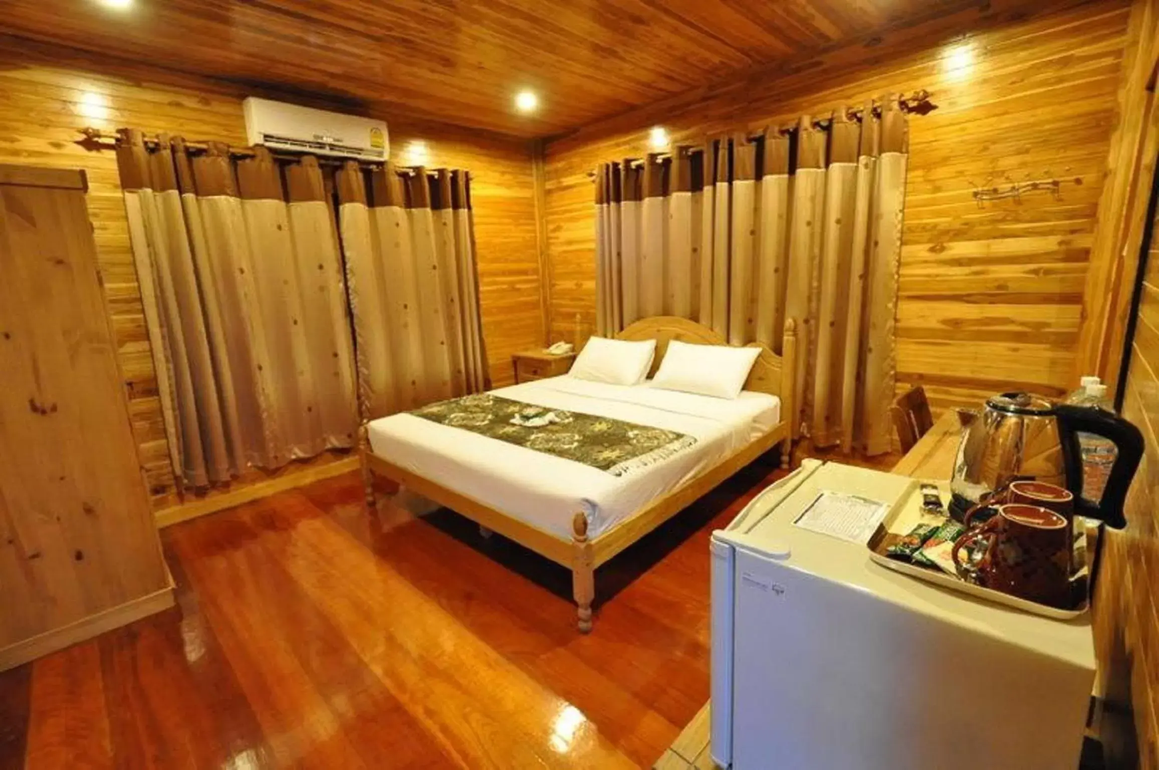 Bed in Basaya Beach Hotel & Resort
