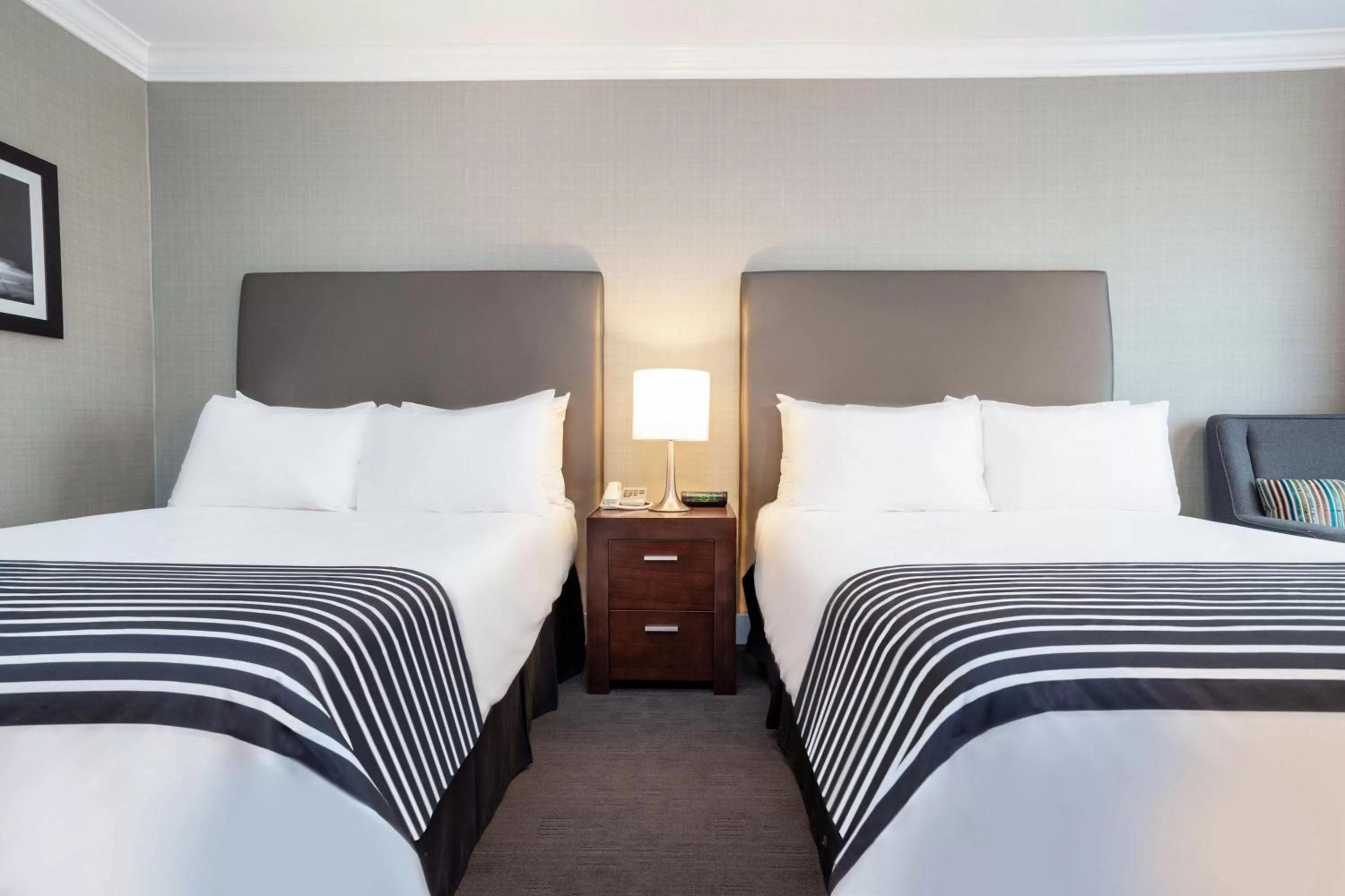 Photo of the whole room, Bed in Sandman Hotel Vancouver Airport