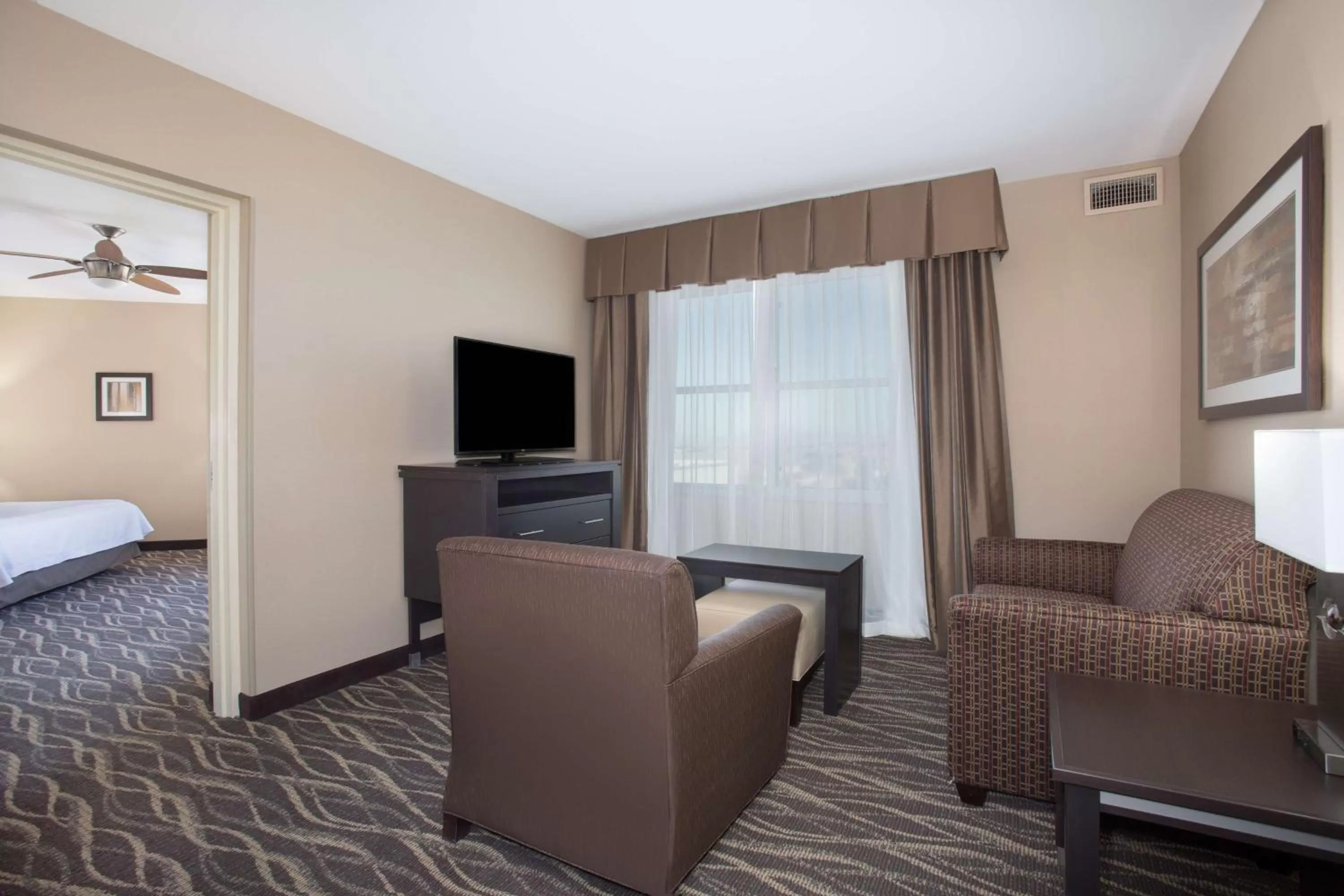 Living room, Bed in Homewood Suites by Hilton South Las Vegas