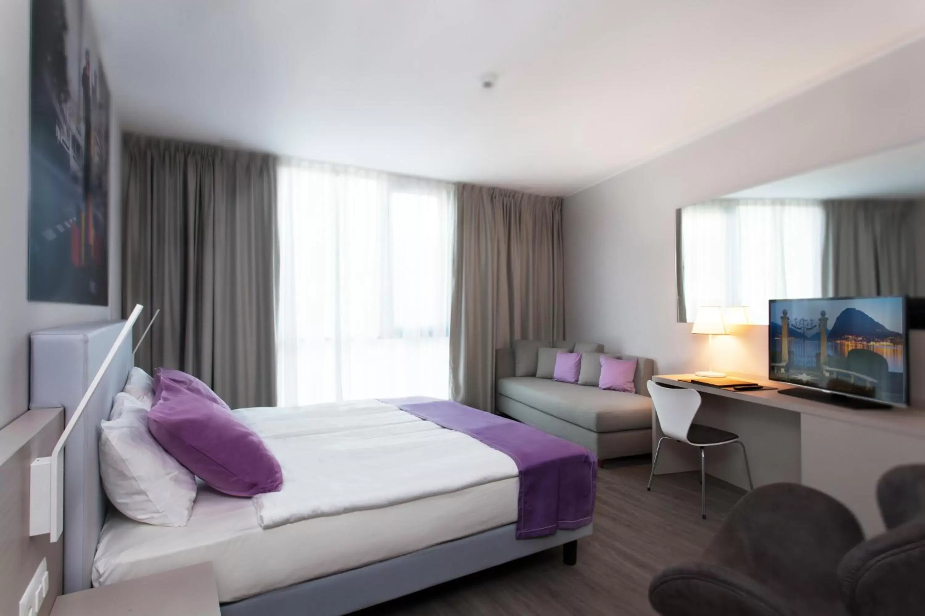 Bed in Hotel City Lugano Bed in Hotel City Lugano