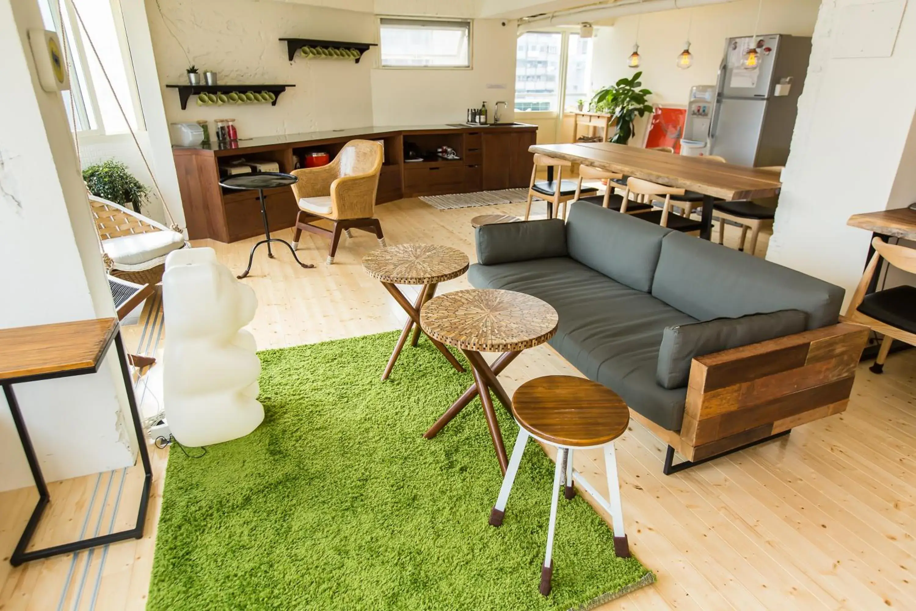 Communal lounge/ TV room, Seating Area in Mr Lobster's Secret Den Design Hostel