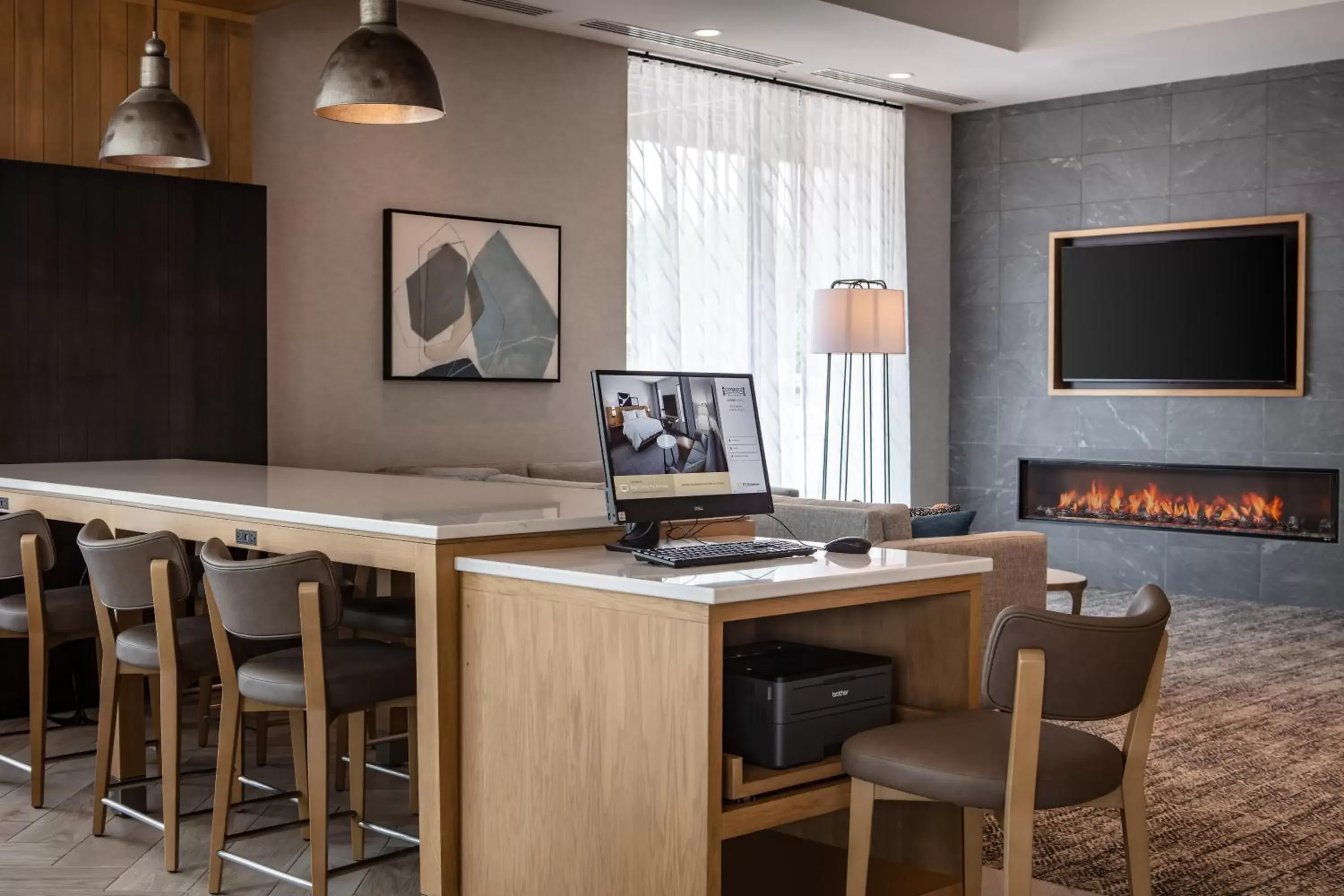 Business facilities, TV/Entertainment Center in Staybridge Suites - Iowa City - Coralville, an IHG Hotel