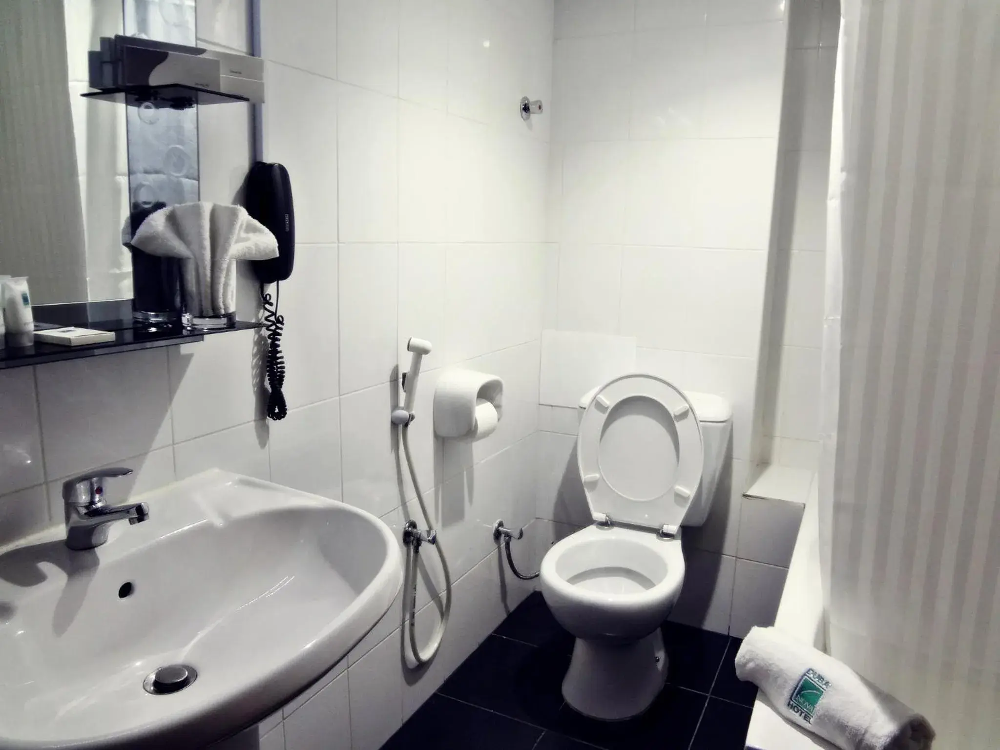 Toilet, Bathroom in Grand Nova Hotel