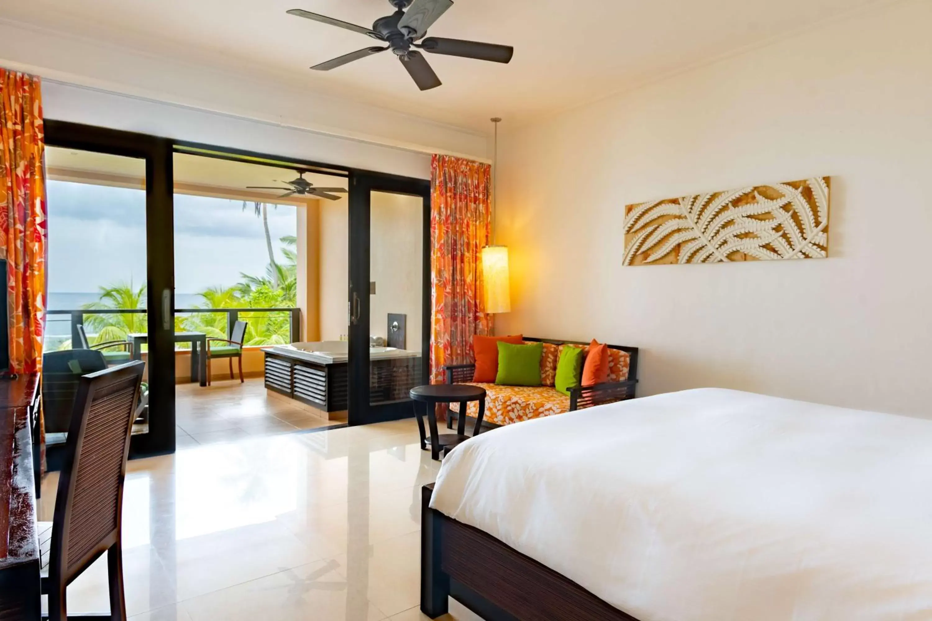 Bed in DoubleTree by Hilton Seychelles Allamanda Resort & Spa