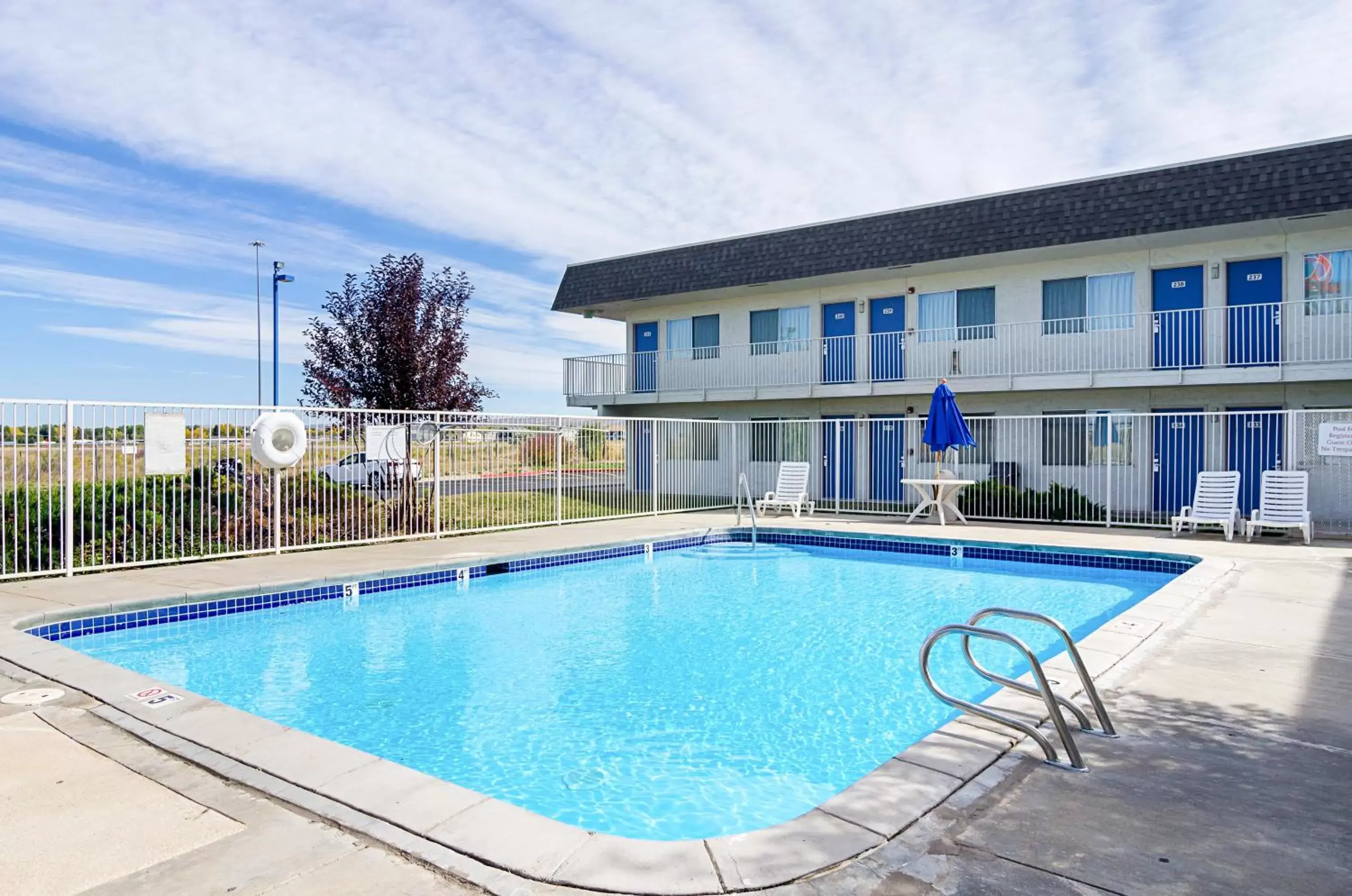 Swimming pool, Property Building in Motel 6-Laramie, WY