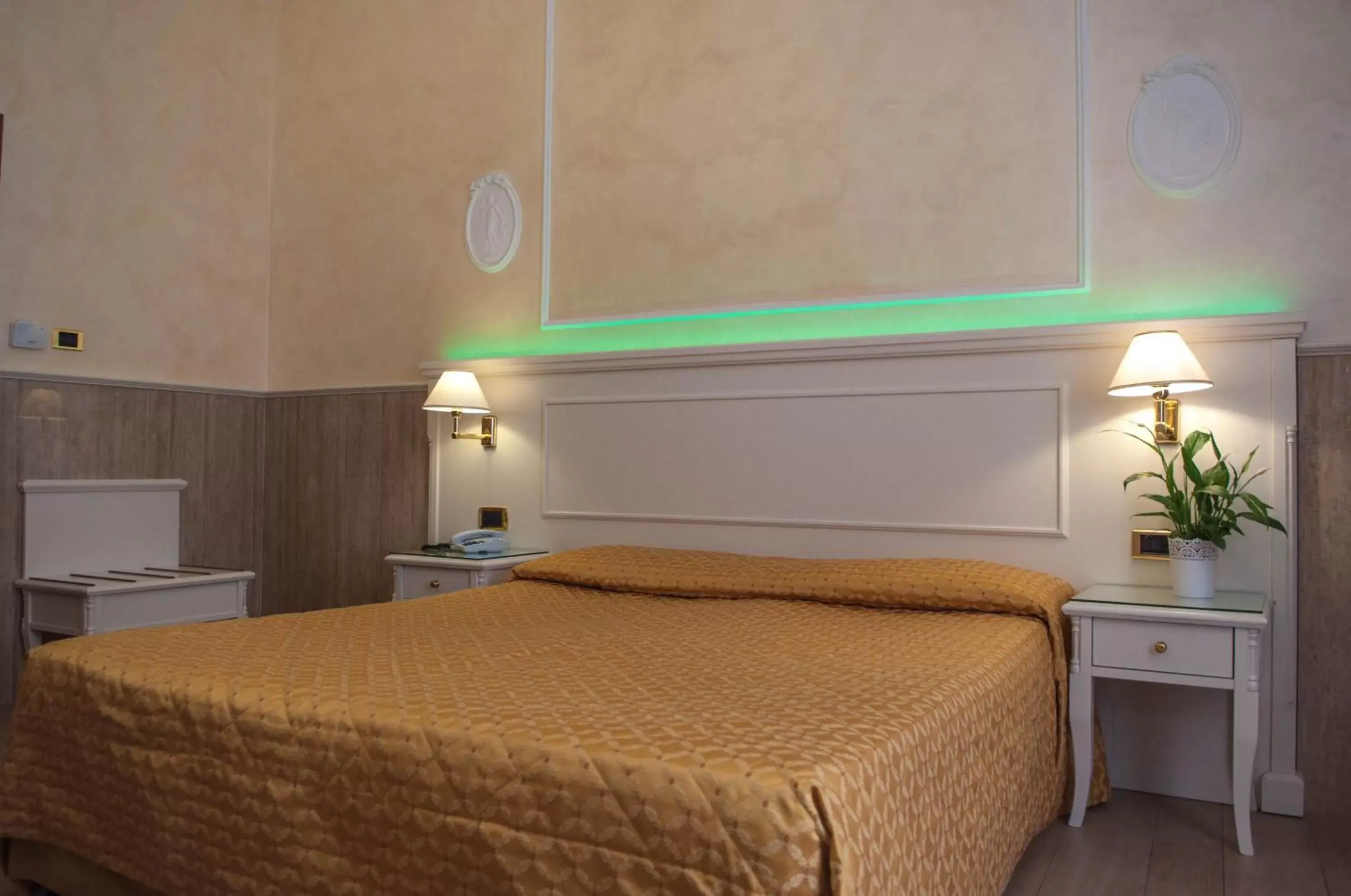Bed in Hotel Palladium Palace