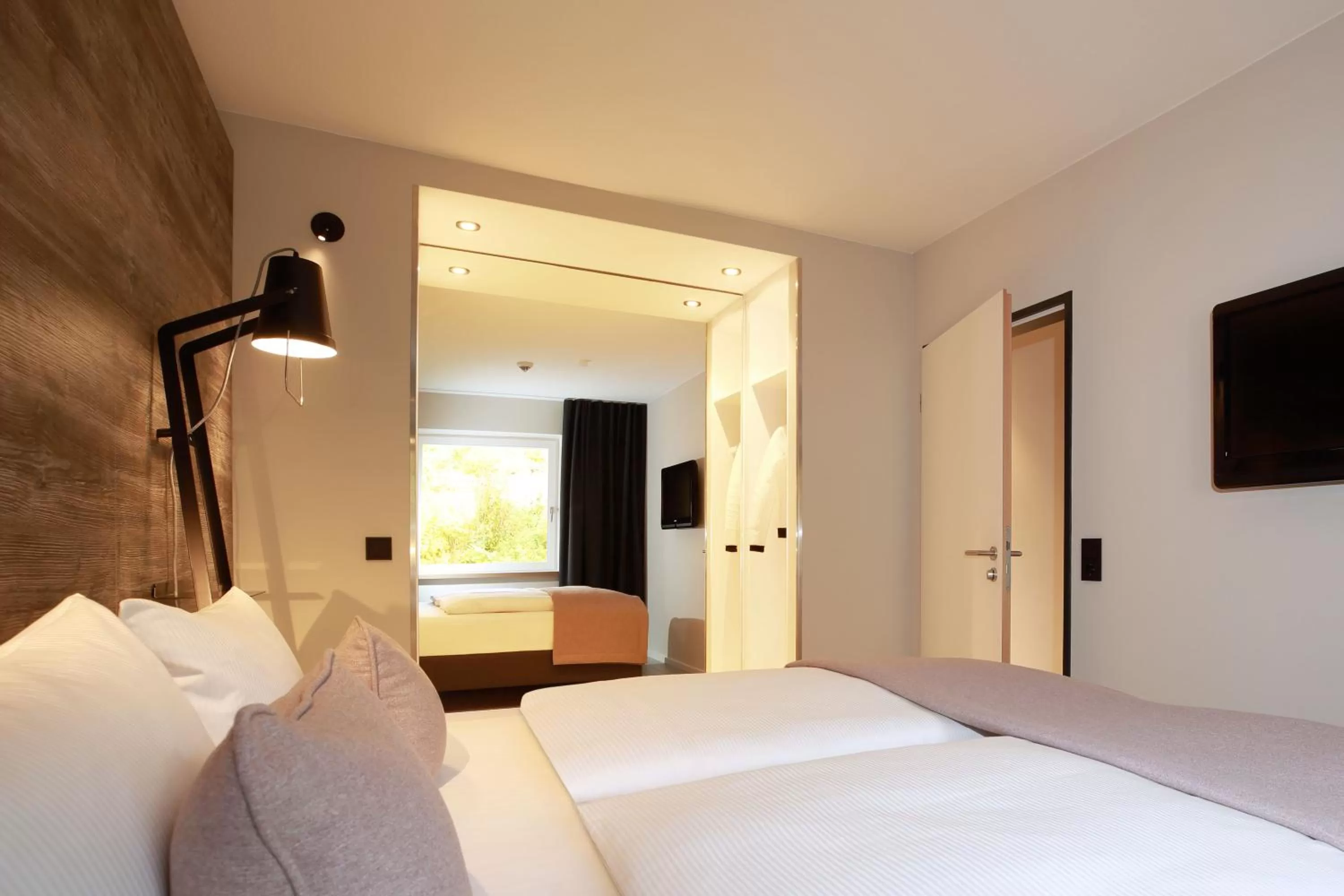 Photo of the whole room, Bed in Dorint Resort Winterberg