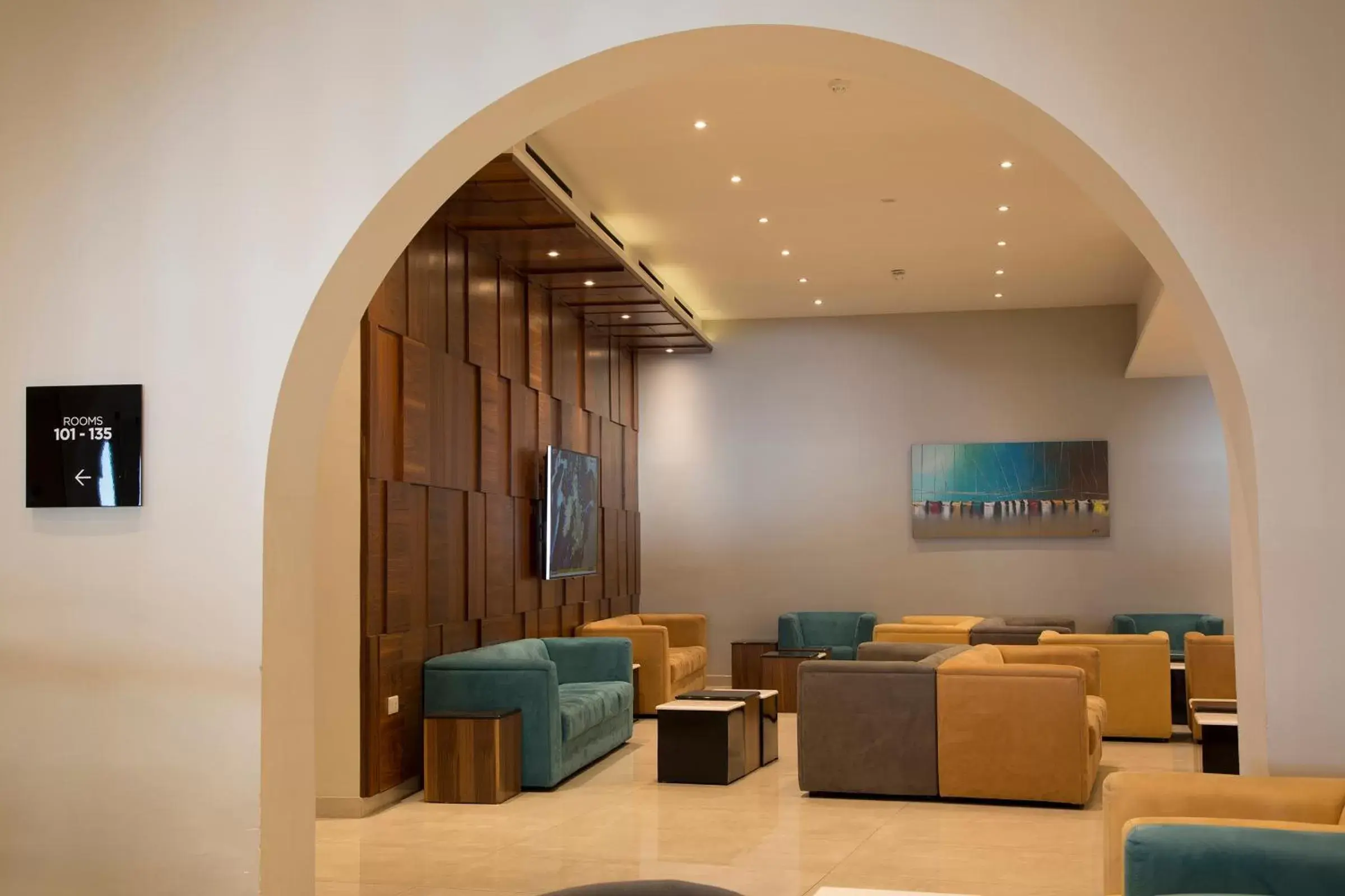 Communal lounge/ TV room, Seating Area in Paradise Bay Resort