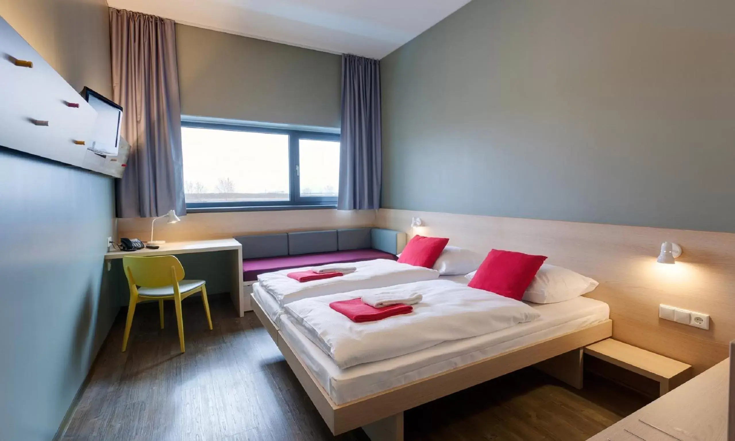 Bedroom, Bed in MEININGER Hotel Berlin Airport
