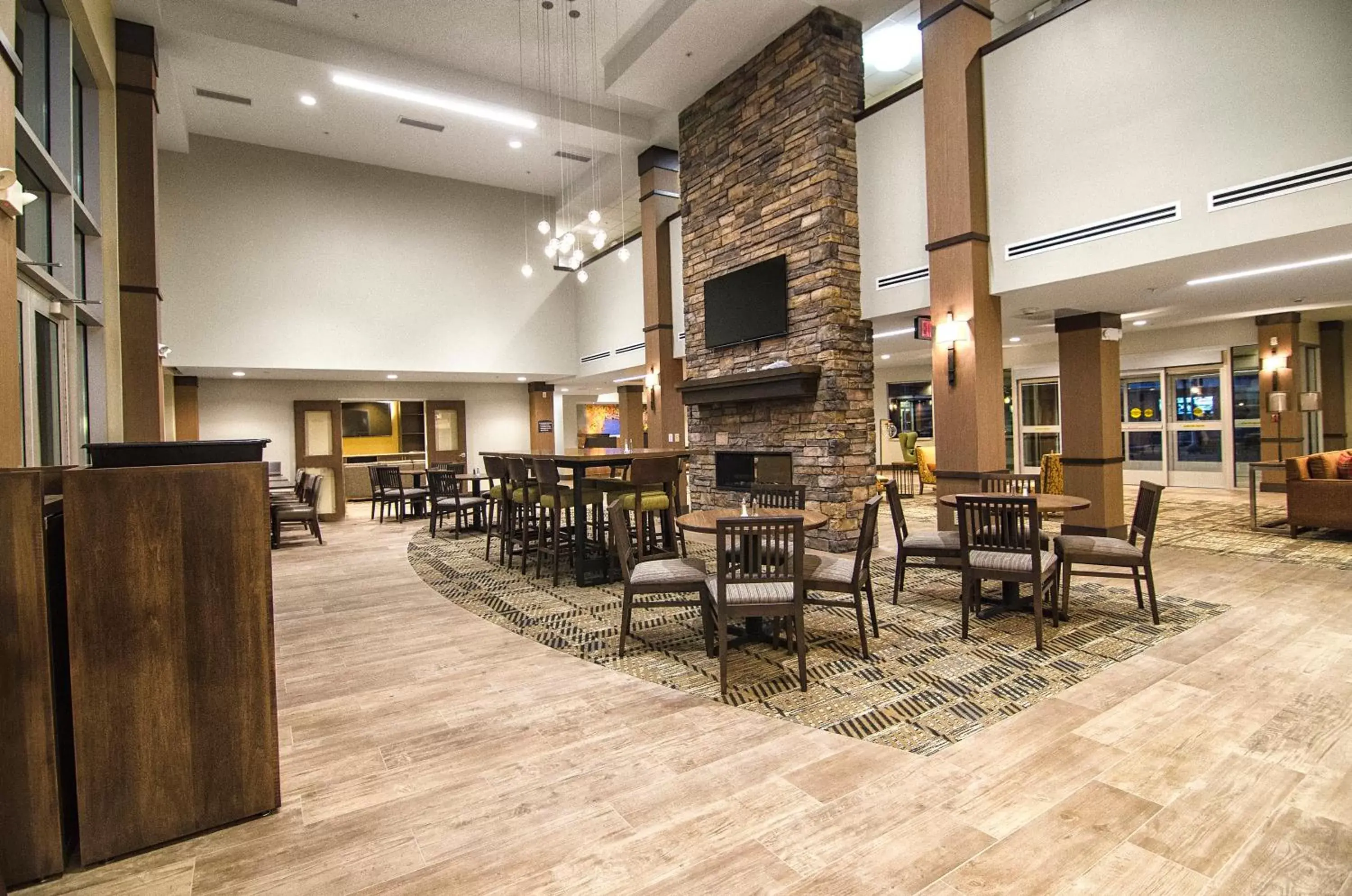 Property building, Restaurant/Places to Eat in Staybridge Suites Marquette, an IHG Hotel
