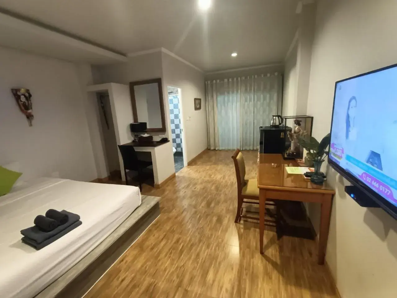 TV and multimedia, TV/Entertainment Center in Aen Guy Boutique Hotel