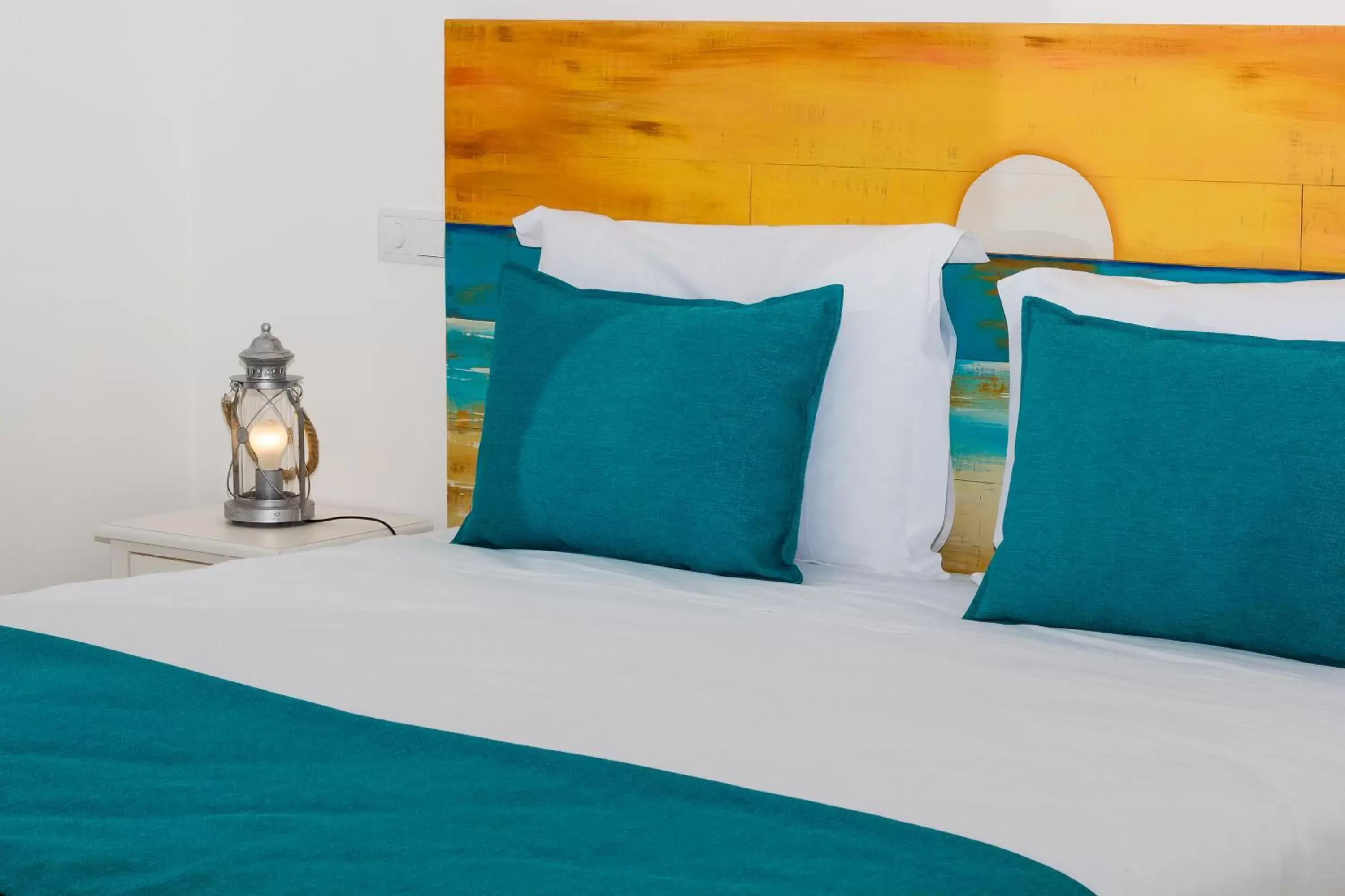 Bed in Mareta Beach House - Boutique Residence