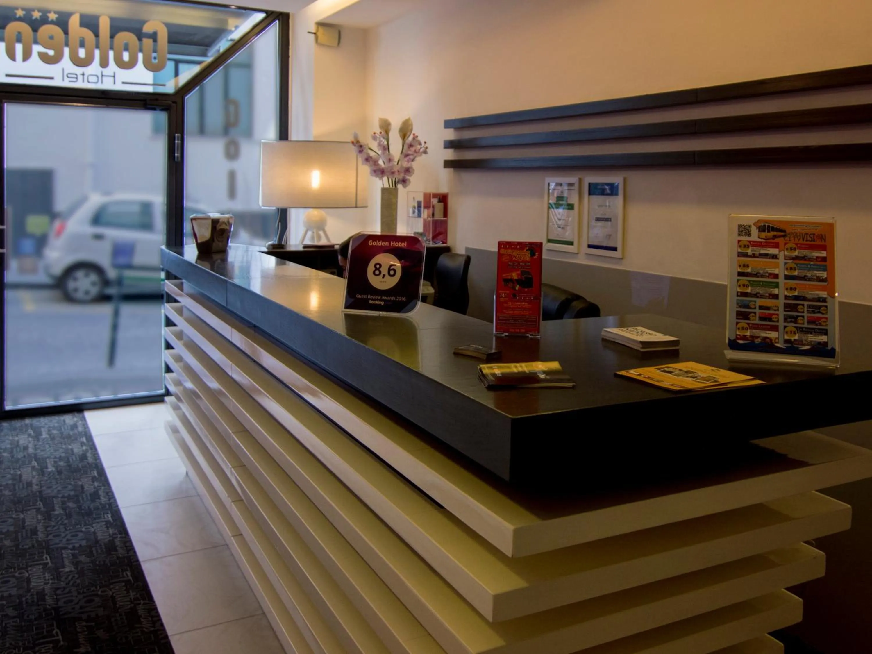 Lobby or reception in Golden Hotel