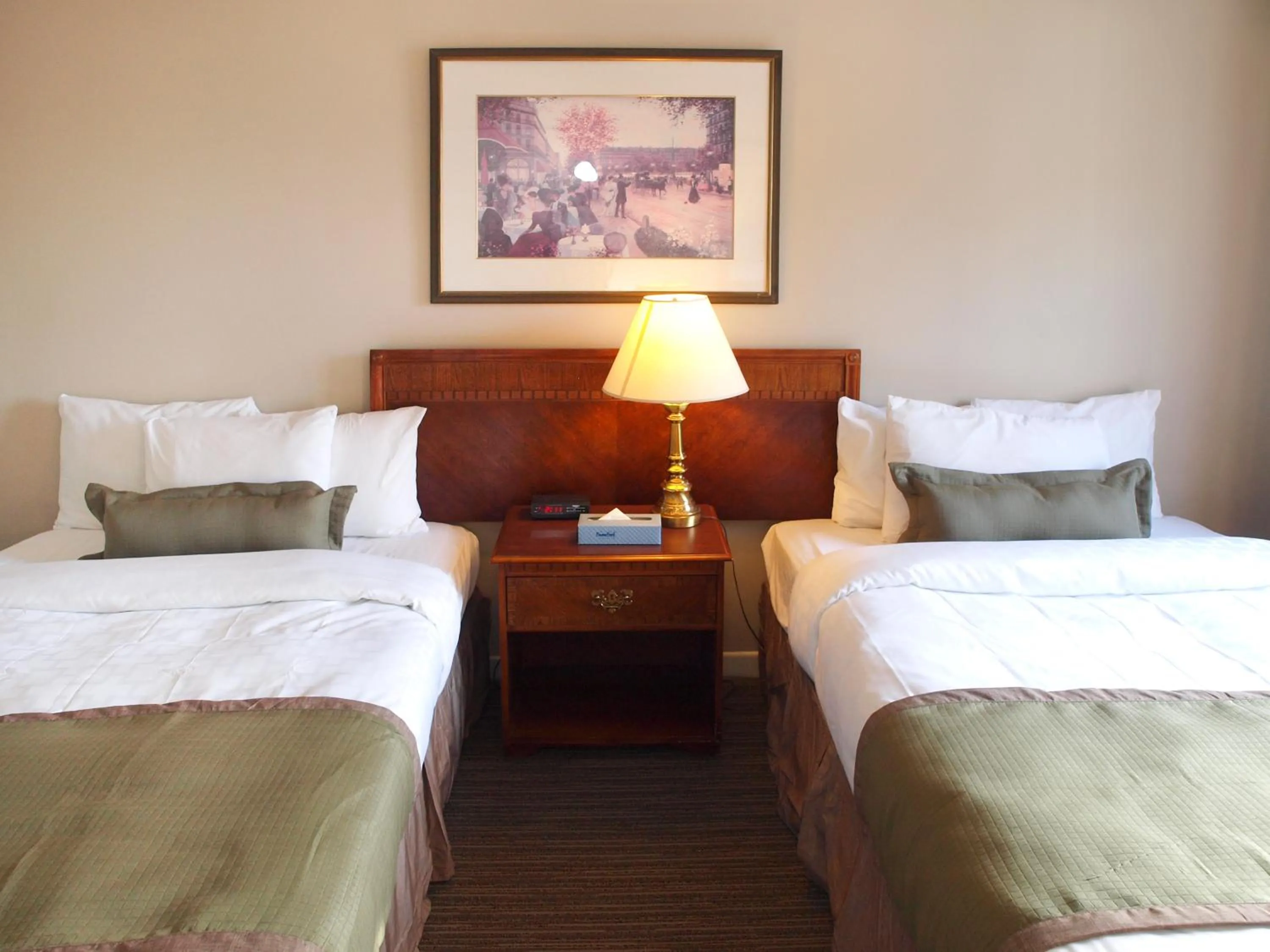 Bed in Beausejour Hotel Apartments/Hotel Dorval