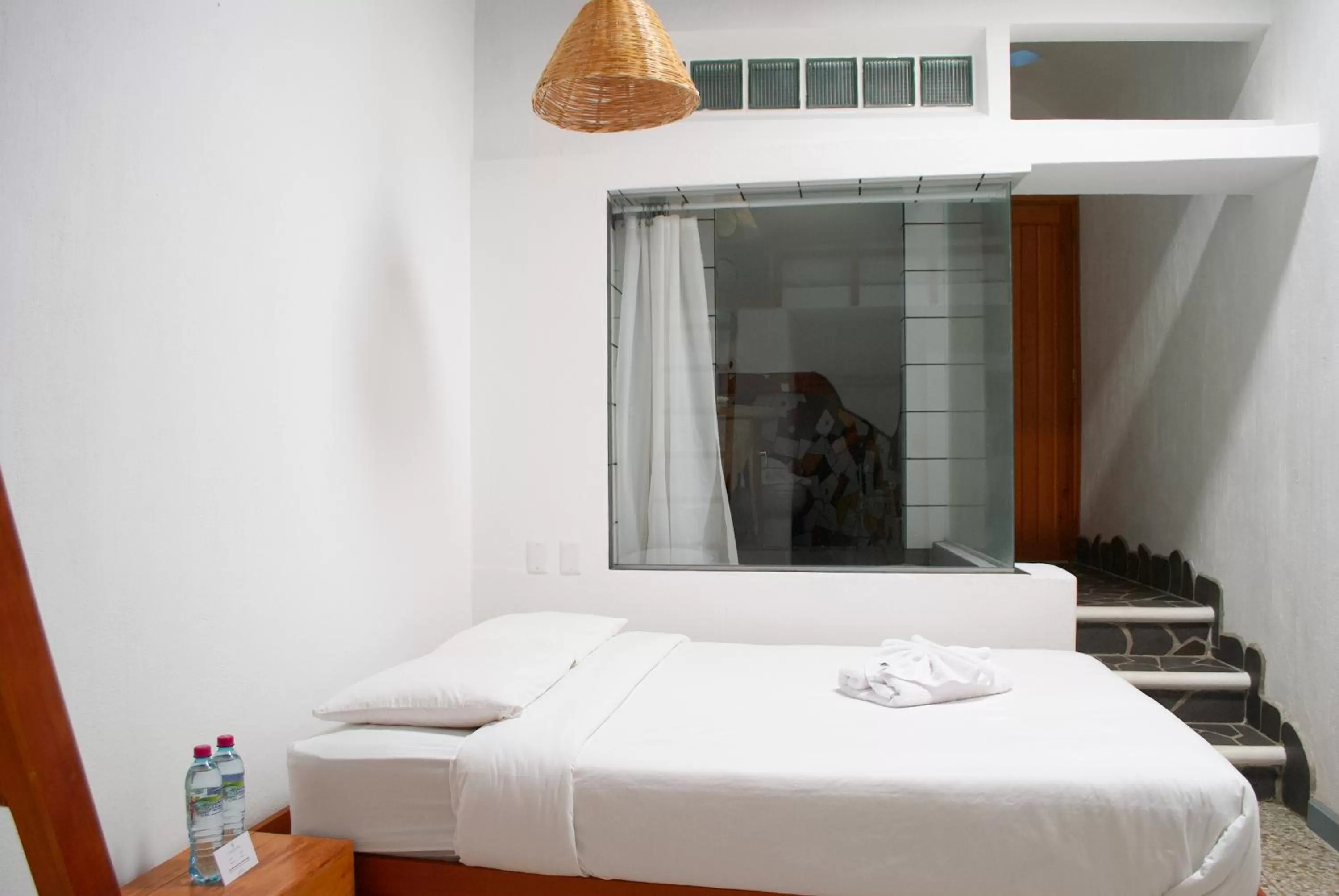 Bed in El Dragon Hotel