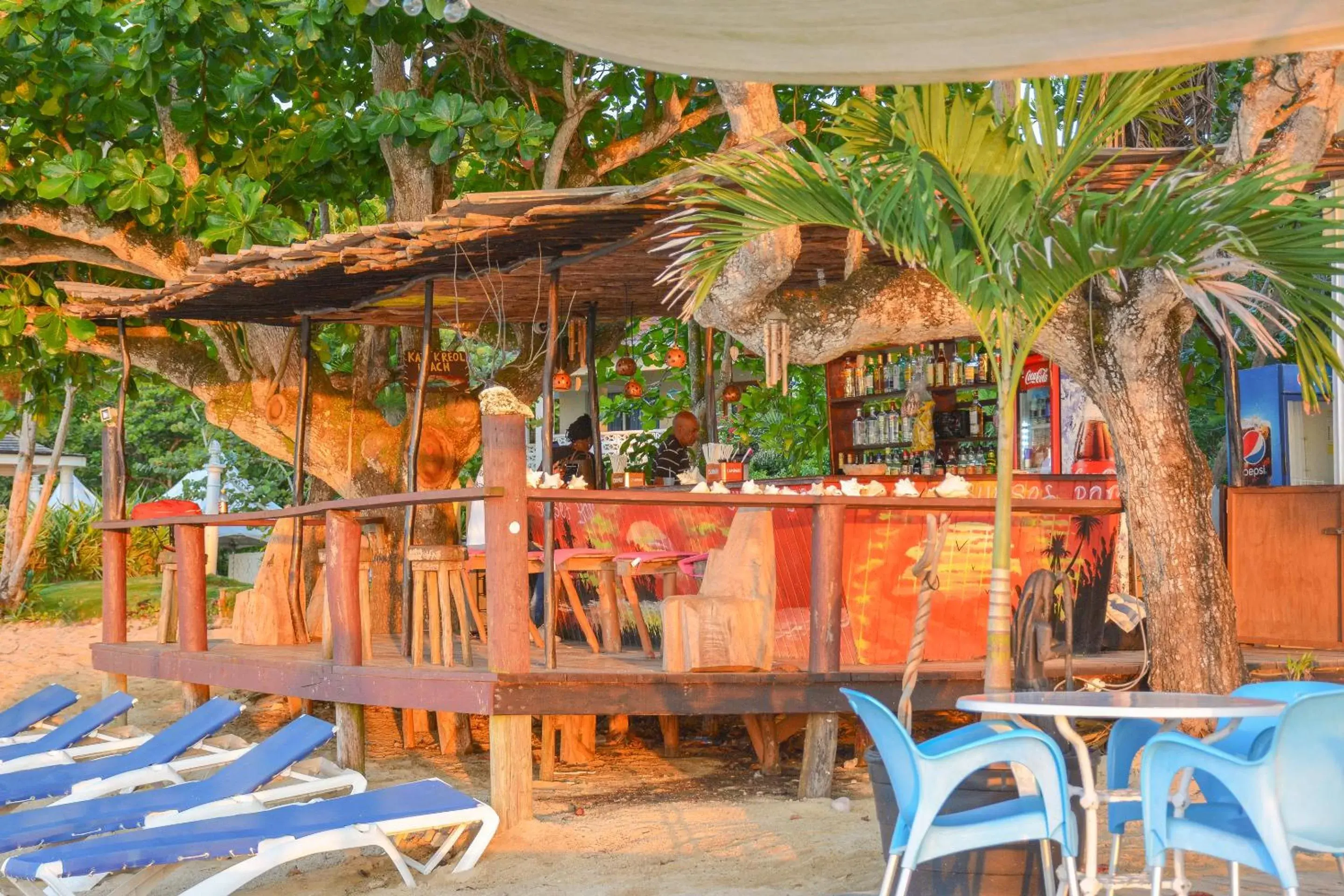 Lounge or bar in Sand and Tan Beach Hotel