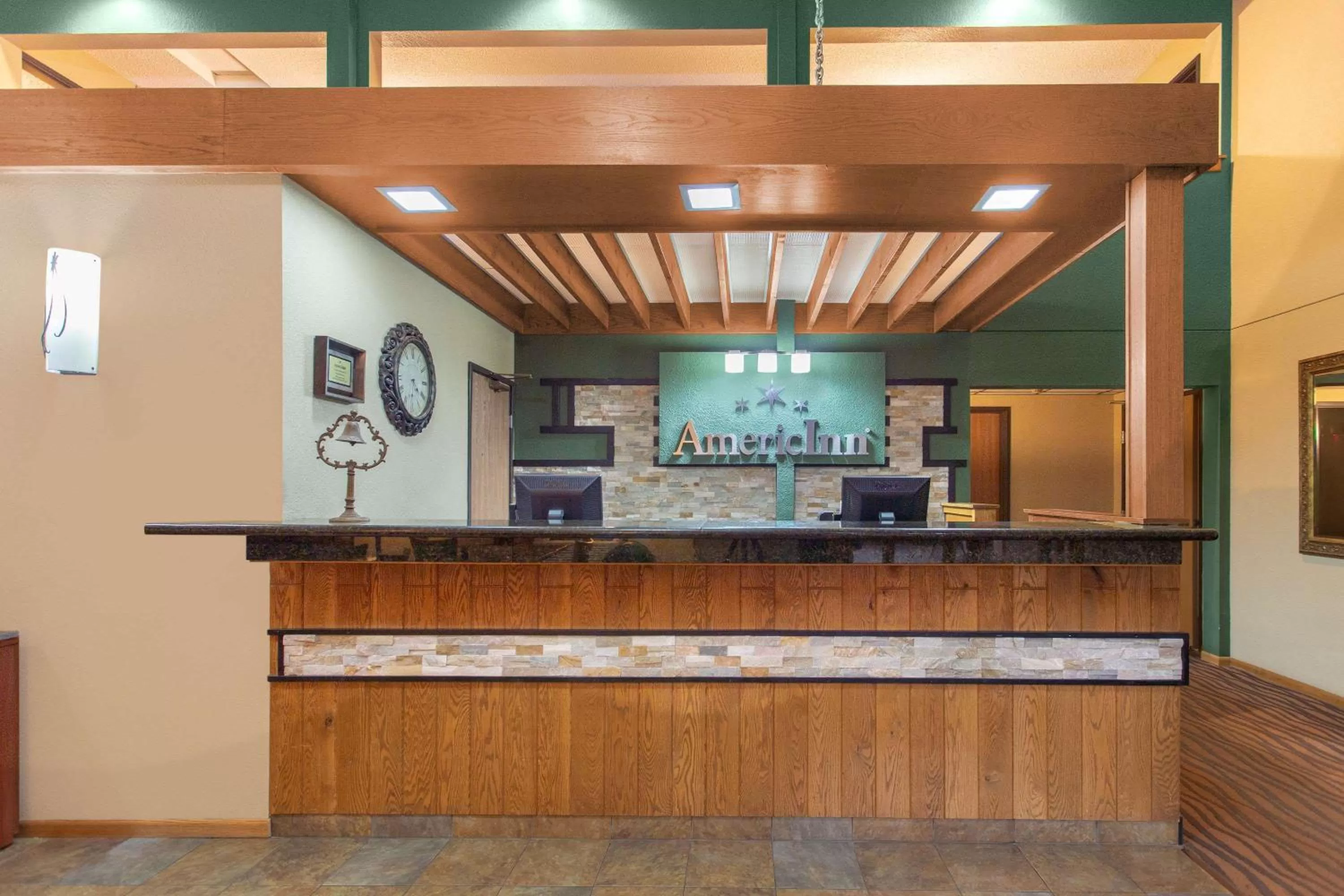 Lobby or reception in AmericInn by Wyndham West Bend