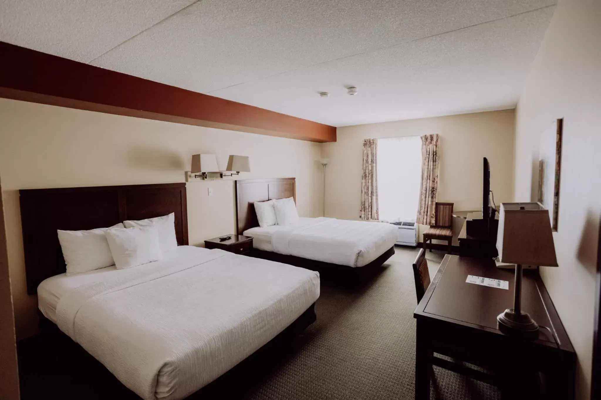 Queen Room with Two Queen Beds - single occupancy in La Place Rendez-Vous Hotel Queen Room with Two Queen Beds - single occupancy in La Place Rendez-Vous Hotel