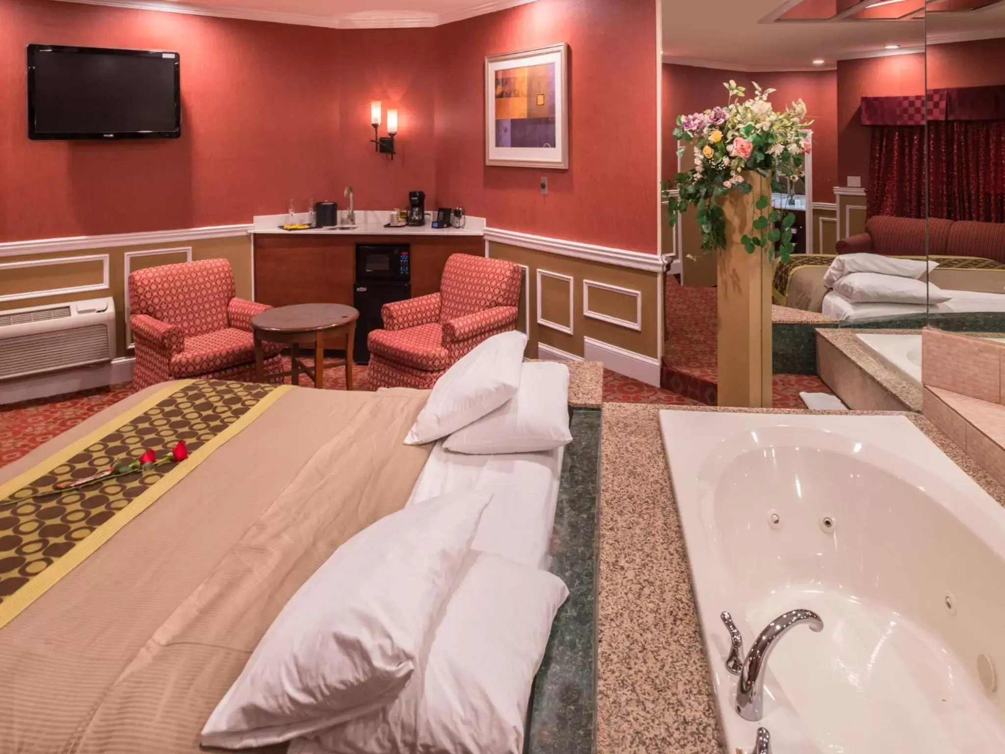 Bed, Lounge/Bar in Inn of The Dove Romantic Luxury & Business Suites